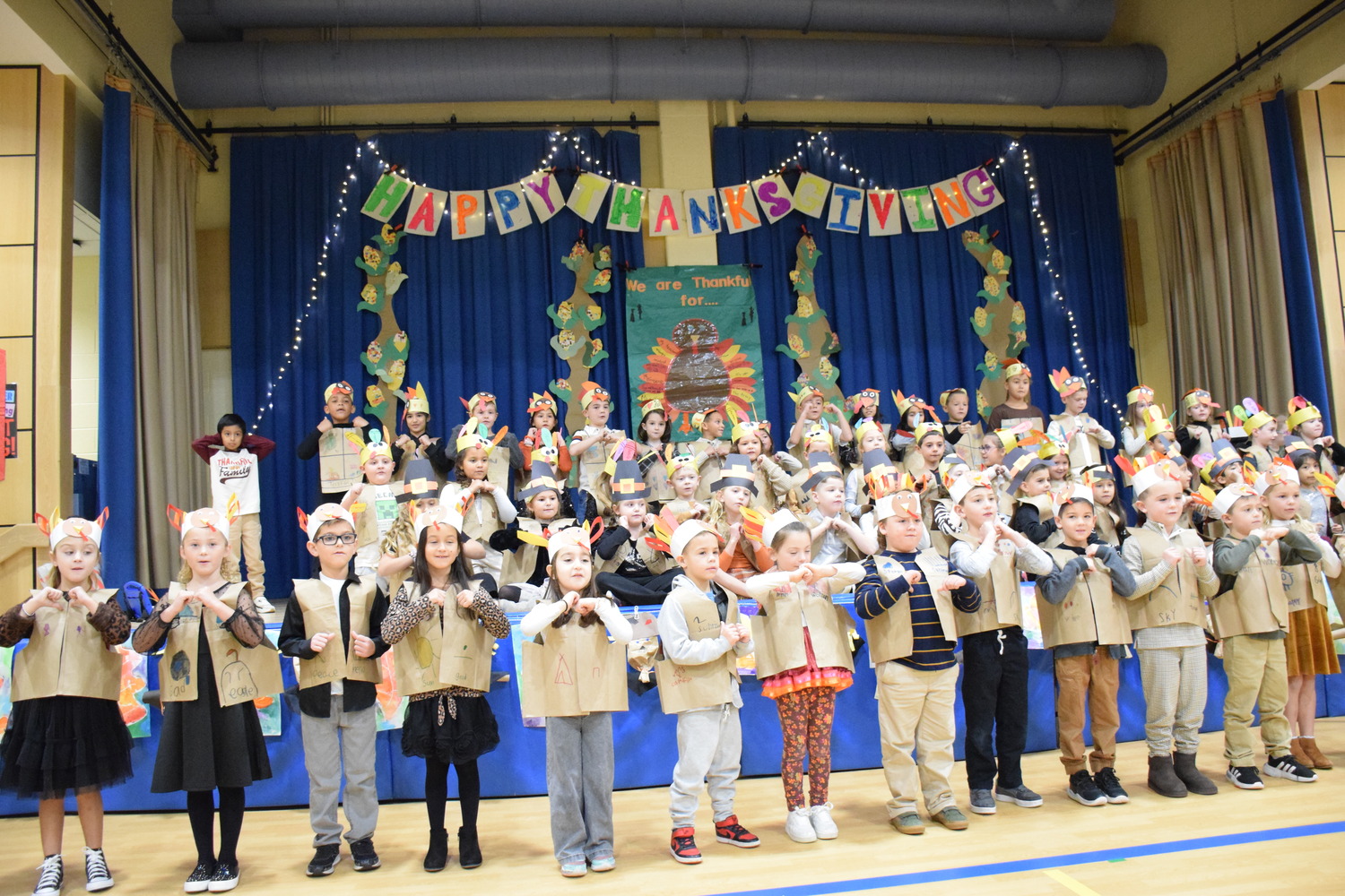 Tuttle Avenue School first graders participated in a Thanksgiving celebration, which recognized and honored all essential workers in their school along with the veterans and active military in their community. It was a morning of poetry and song as each of the grade’s classrooms donned turkey and pilgrim headdresses and took to the stage to perform a variety of Thanksgiving holiday music and to recognize the important work that the faculty and staff do each day.      The school also collectively donated nonperishable food items for those in need during the holiday. The donated items were brought to Lion’s Heart and the Eastport Bible Church to assist in making the community’s holiday brighter. COURTESY EASTPORT-SOUTH MANOR SCHOOL DISTRICT