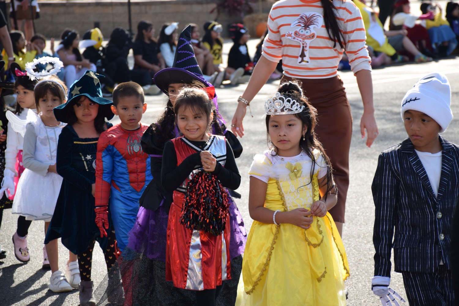 Hampton Bays Elementary School students, dressed in their Halloween costumes, paraded around the school’s bus loop on October 31 for the school’s annual Harvest Parade. The smiling teachers and students marched and waved to the crowd of cheering onlookers as the sounds of traditional Halloween music played in the background. COURTESY HAMPTON BAYS SCHOOL DISTRICT