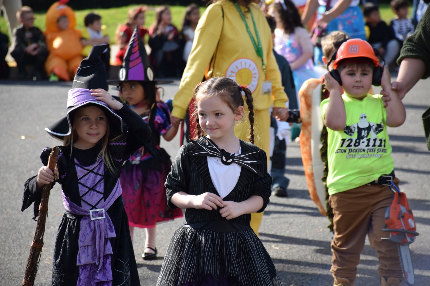 Hampton Bays Elementary School students, dressed in their Halloween costumes, paraded around the school’s bus loop on October 31 for the school’s annual Harvest Parade. The smiling teachers and students marched and waved to the crowd of cheering onlookers as the sounds of traditional Halloween music played in the background. COURTESY HAMPTON BAYS SCHOOL DISTRICT