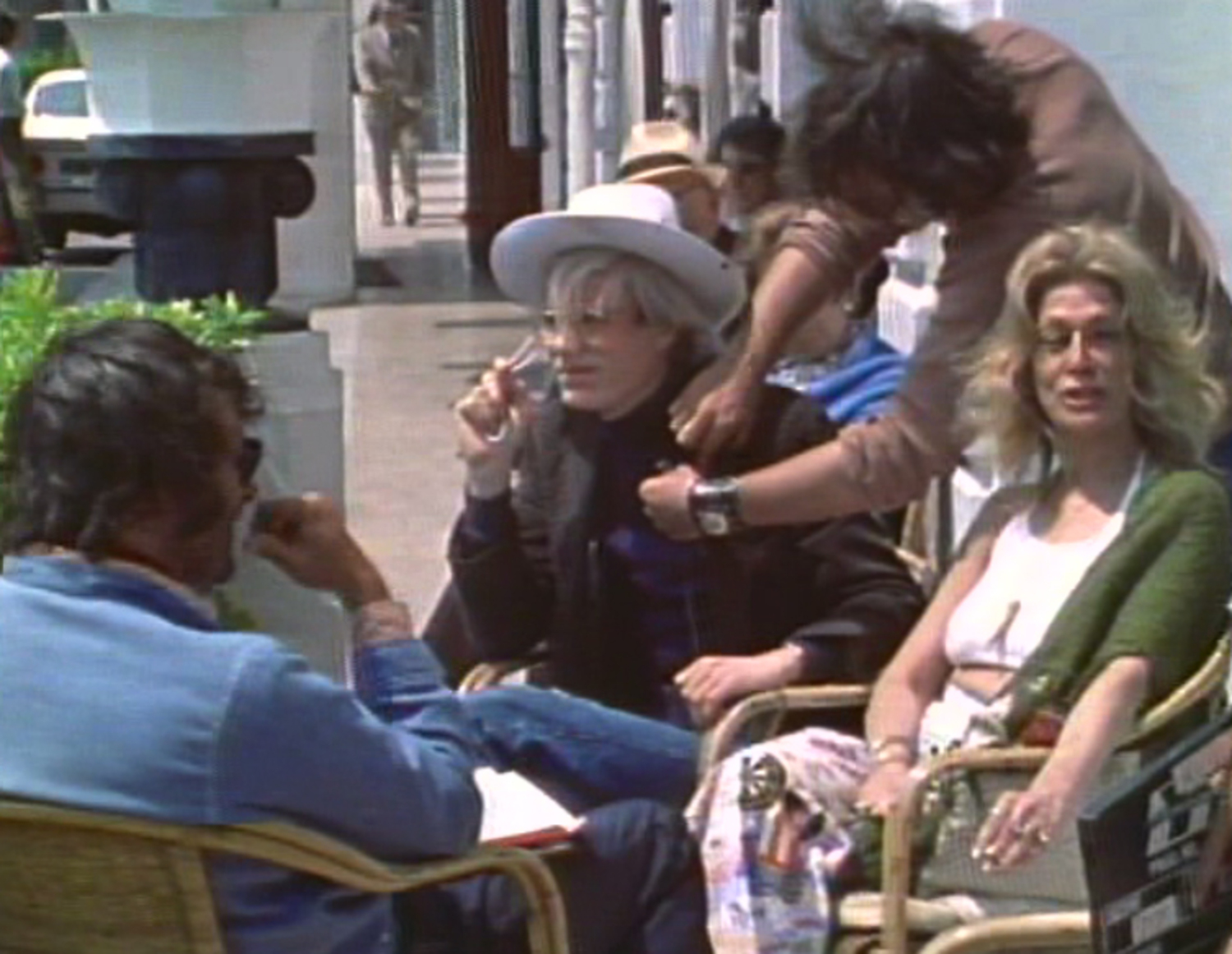 Andy Warhol and Sylvia Miles during filming of Lana Jokel's 1973 film 