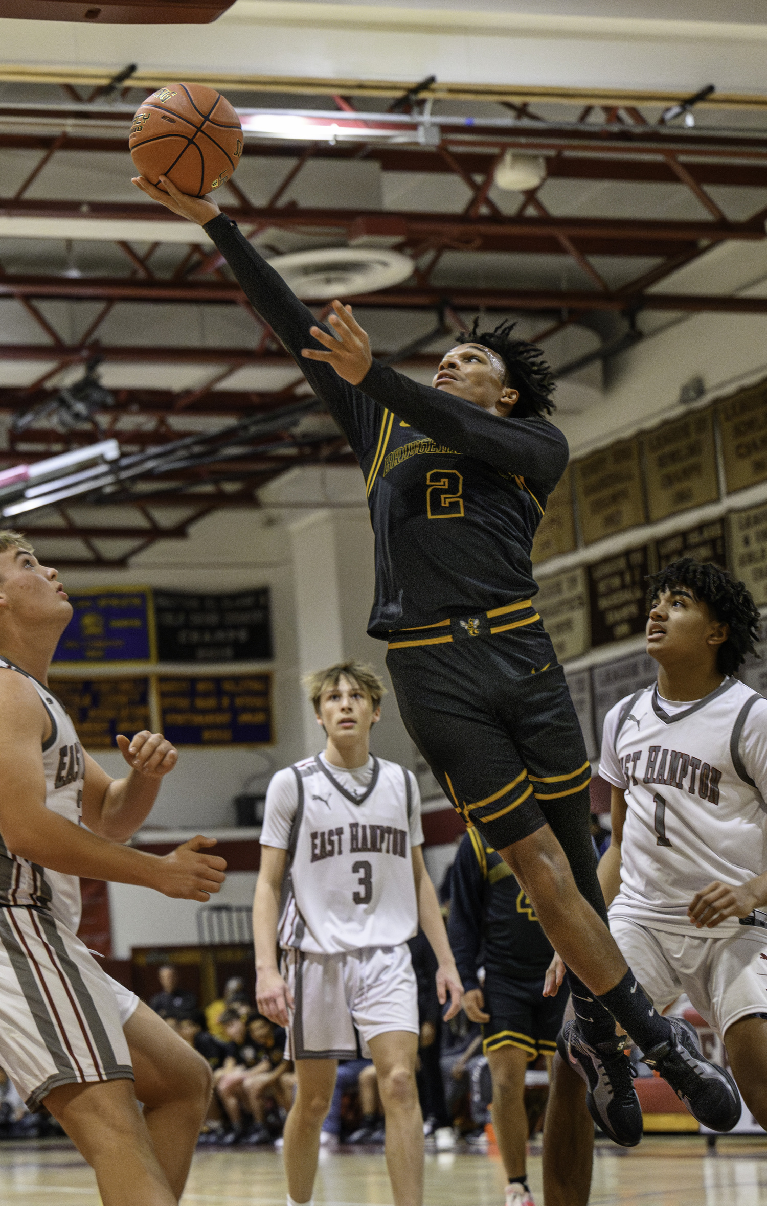 Bridgehampton junior Jai Feaster goes in for two points.   MARIANNE BARNETT