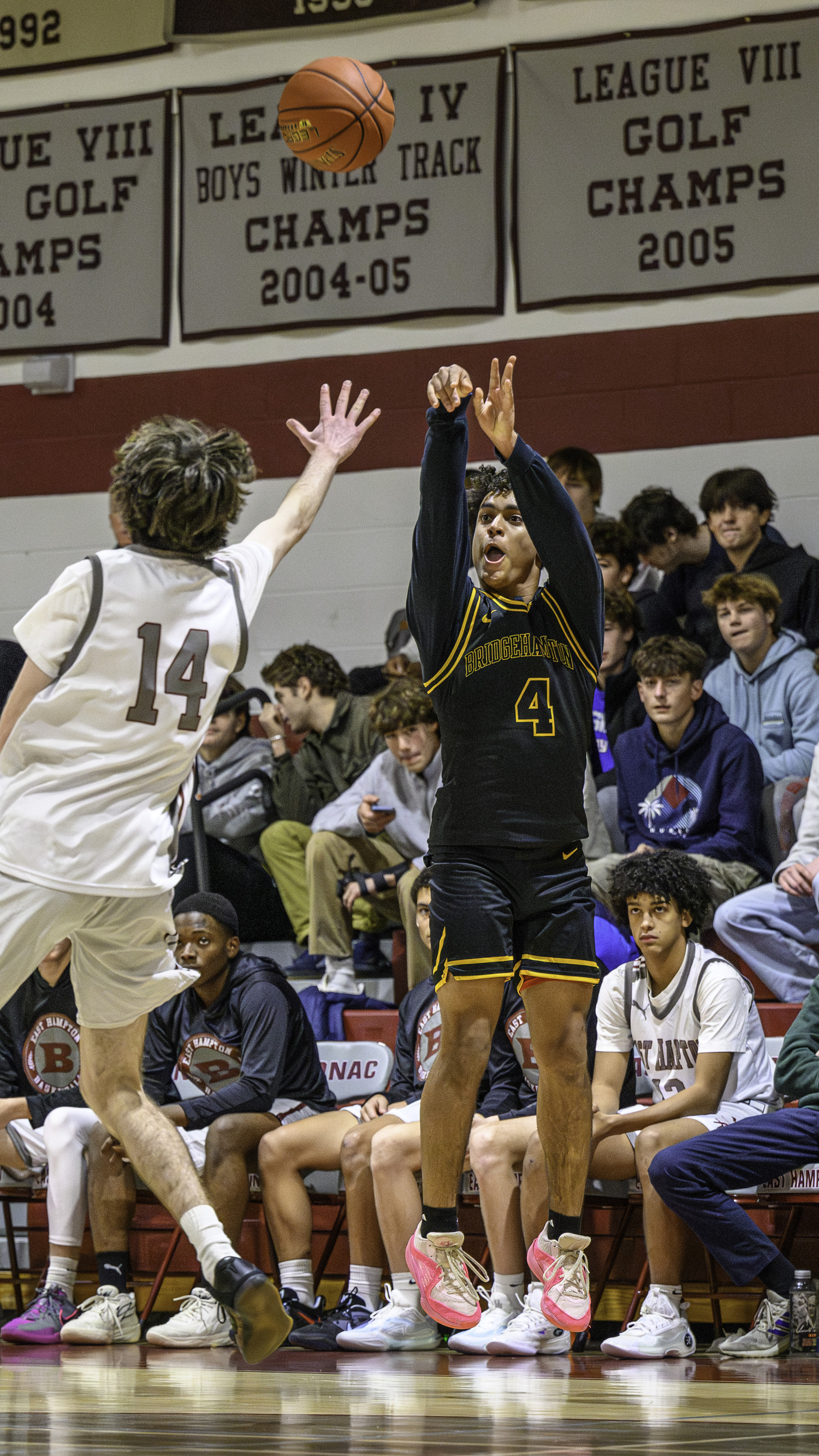 Bridgehampton junior Alex Davis shoots a three-pointer.   MARIANNE BARNETT