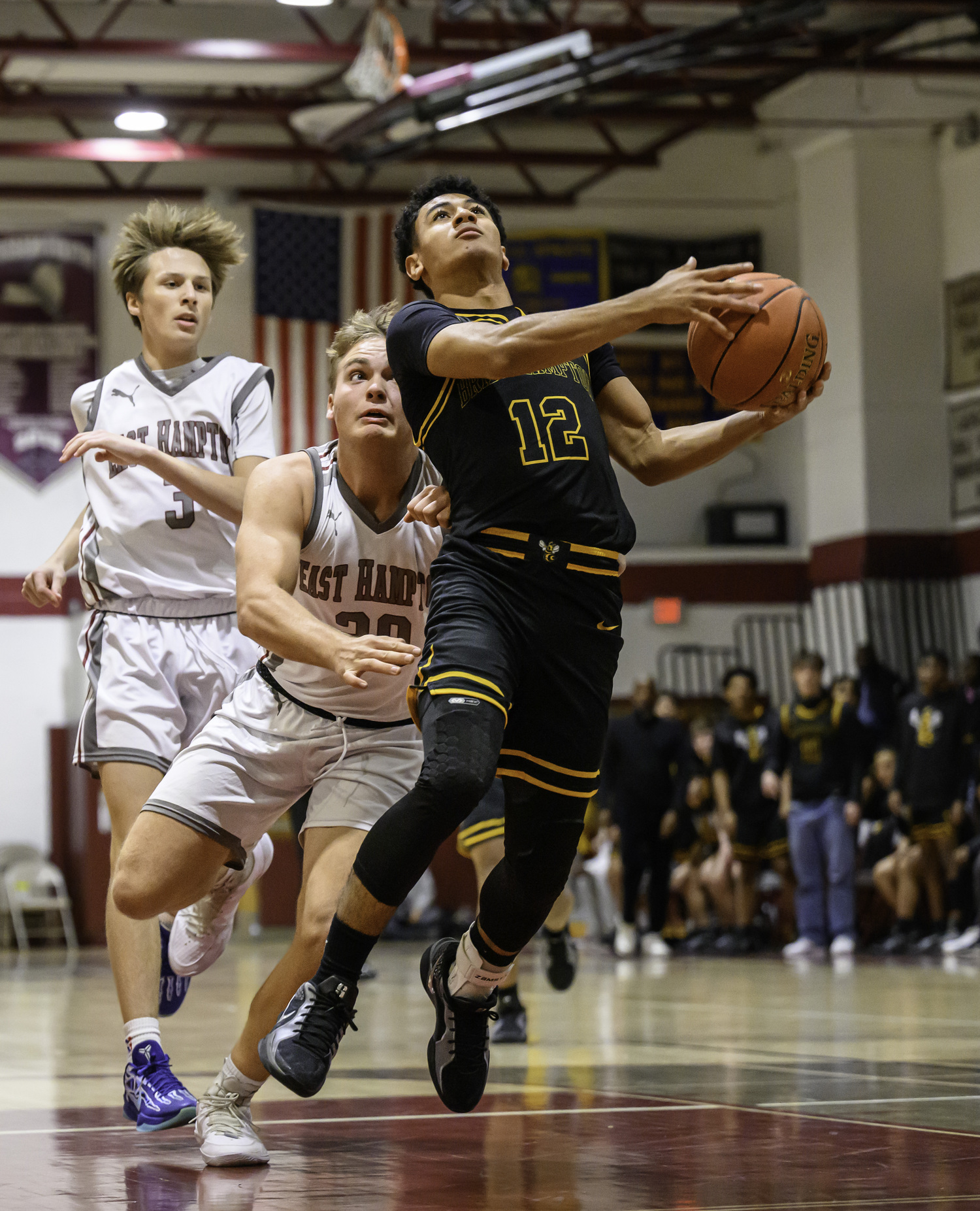 Bridgehampton sophomore Xavier Johnson goes in for a layup.   MARIANNE BARNETT