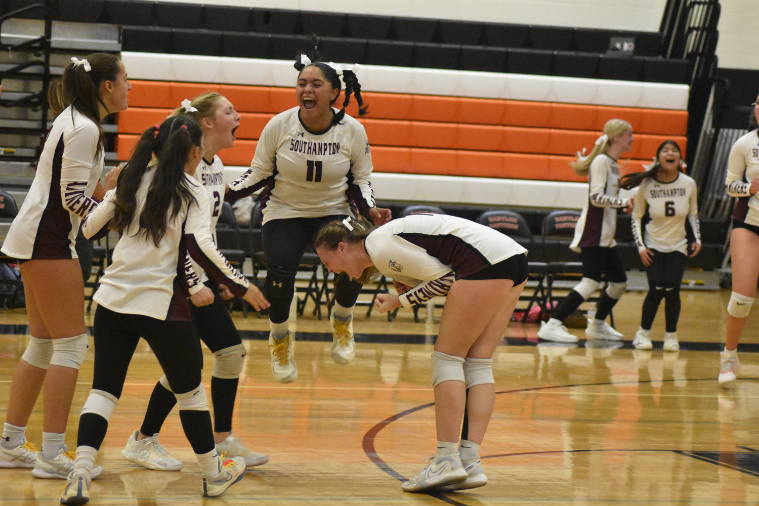 November 17 - The Mariners are ecstatic after pulling out a 28-26 victory in the first set of the Suffolk County Class B semifinals at Babylon, a match they eventually won, 3-1, to advance to the county championship where they lost a close match to Center Moriches.  DREW BUDD