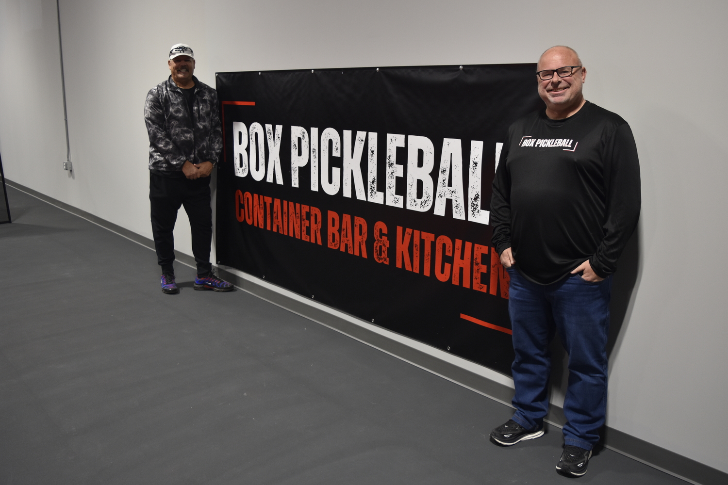 Scott Green, left, is running the pickleball with owner Peter Bachmore.   DREW BUDD