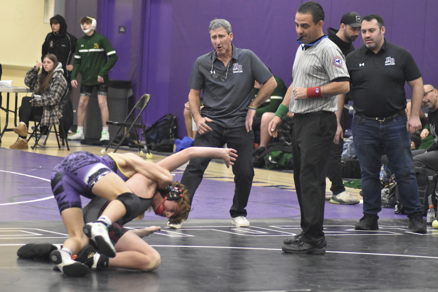 Coaches Dave Orlando, left, and Mike Lloyd try to direct from the sidelines.   DREW BUDD