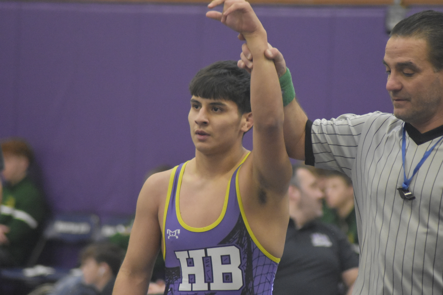 Senior Bayman Angel Valverde gets his arm raised. He went 2-0 on Saturday.   DREW BUDD