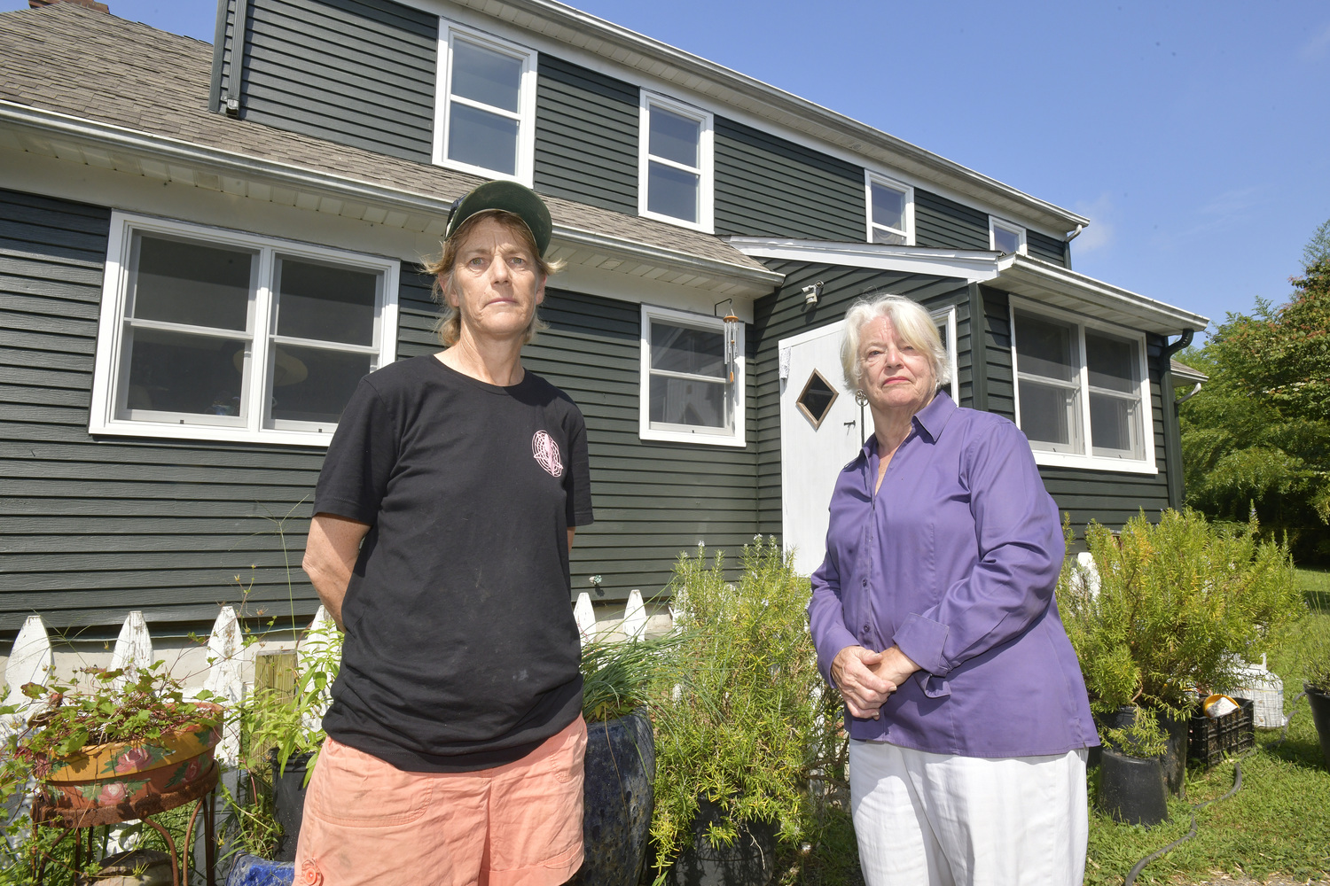 August 29 - Marilee and Lee Foster at the home used as employee housing next to Sagaponack Village Hall.  DANA SHAW