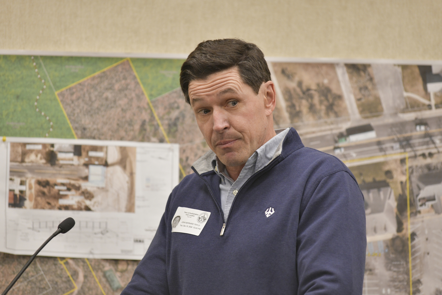 John Tintle, owner of Sand Land in Noyac, speaks at Tuesday's meeting.  DANA SHAW