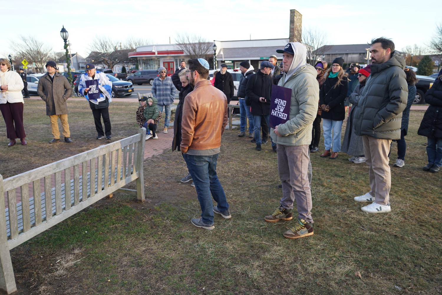 Rabbi Josh Franklin of the Jewish Center of the Hamptons, center, was among the speakers at a December 19 rally against anti-Semitism. DOUG KUNTZ