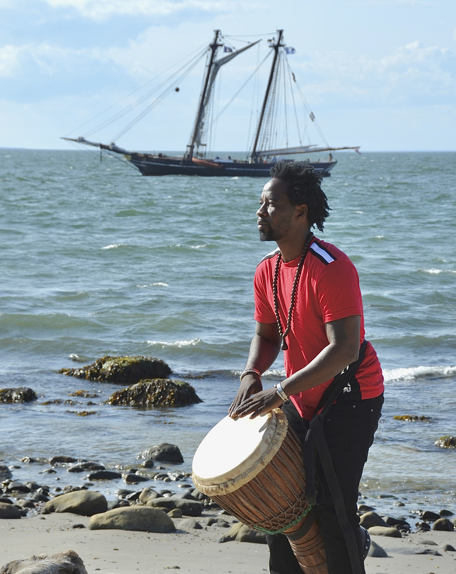 August 29 - A drummer performs at the welcoming ceremony held for the replica of the Amistad on August 22 at Culloden Point in Montauk.  KYRIL BROMLEY