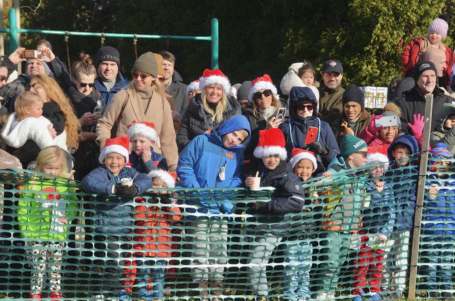 Santa arrives via helicopter in Herrick Park in East Hampton on Saturday morning.  KYRIL BROMLEY