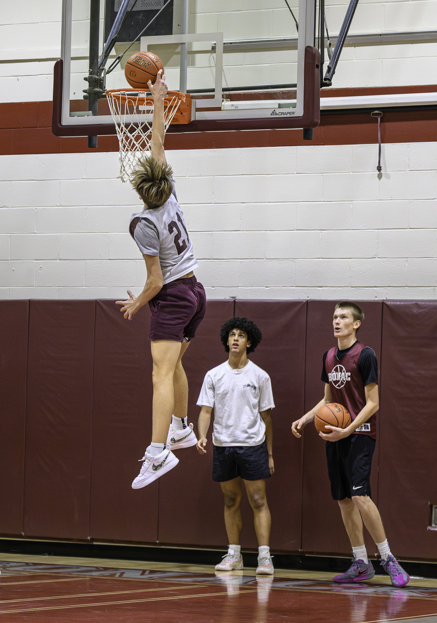 Toby Foster scores on a layup during practice.   MARIANNE BARNETT