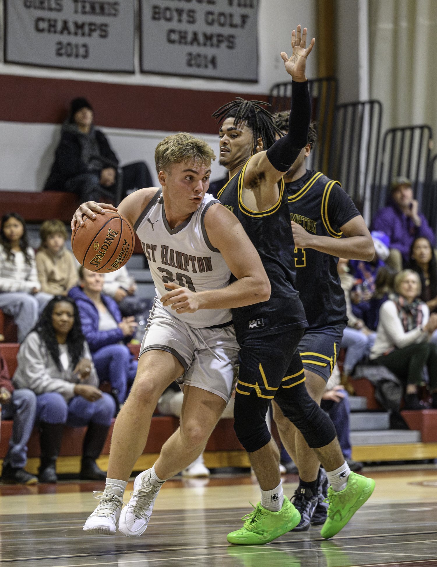 East Hampton senior Carter Dickinson looks to get around Bridgehampton senior Jaylen Harding.  MARIANNE BARNETT