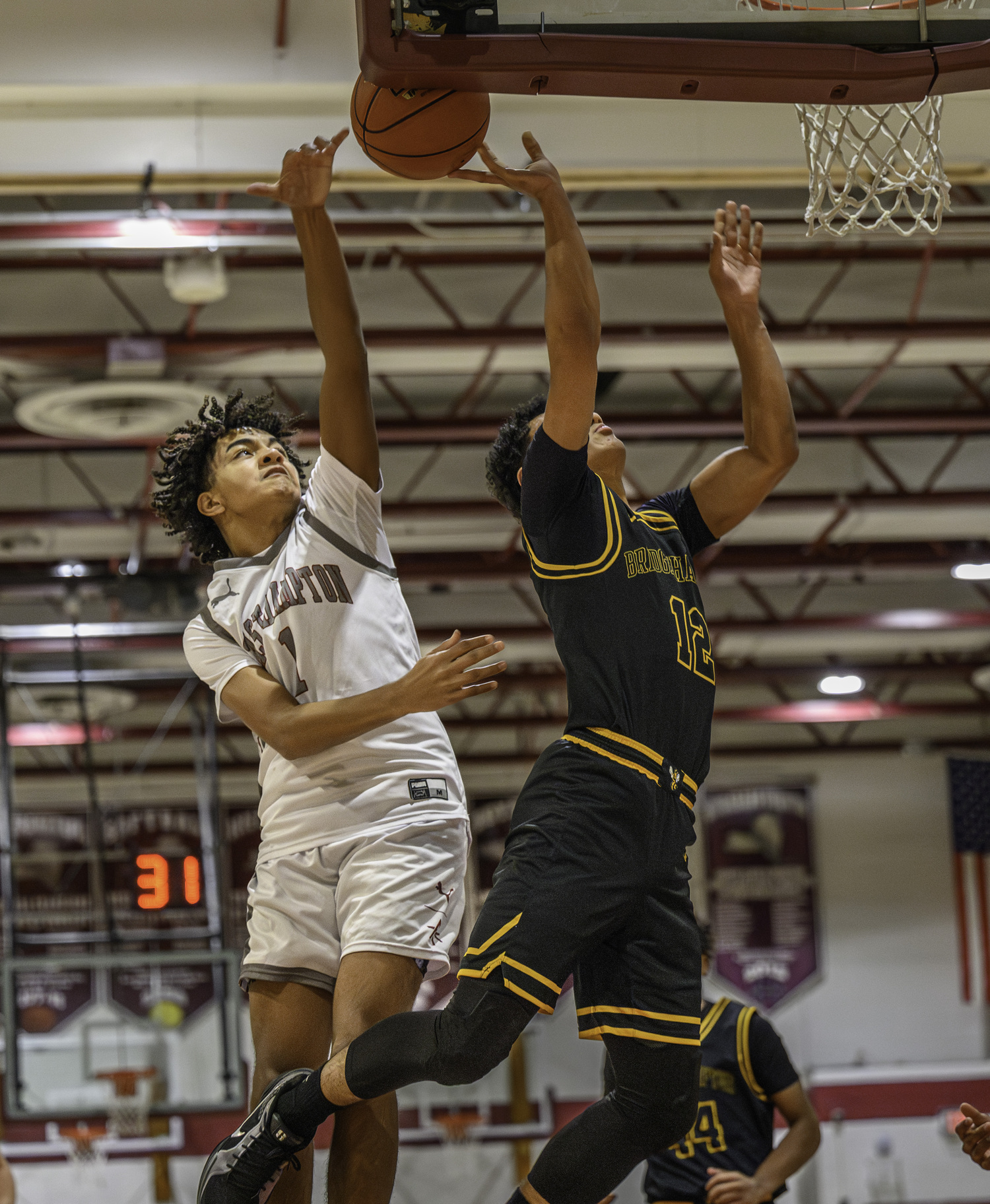 Mason Jefferson blocks Xavier Johnson.   MARIANNE BARNETT