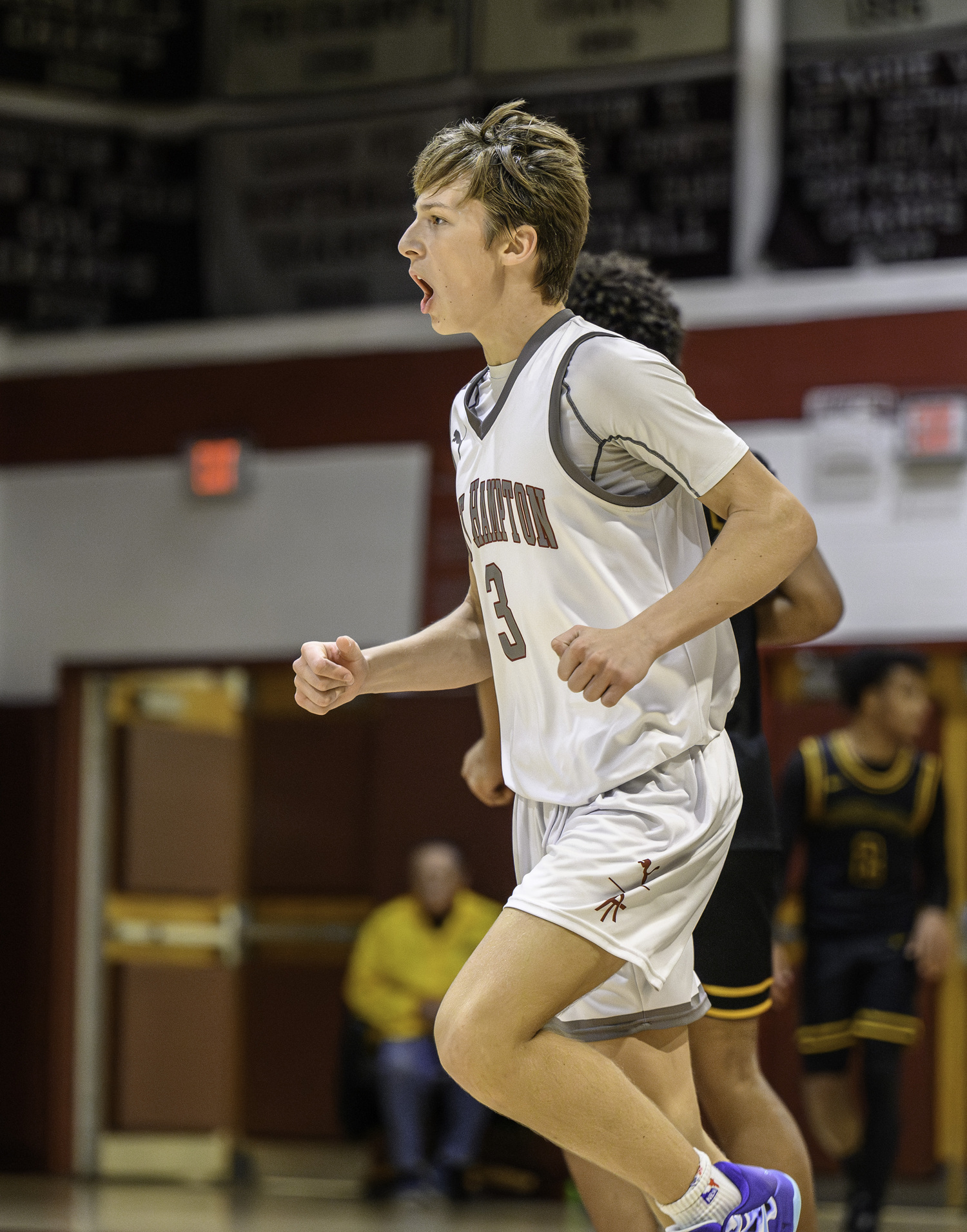 Toby Foster is pumped up after scoring a basket.   MARIANNE BARNETT