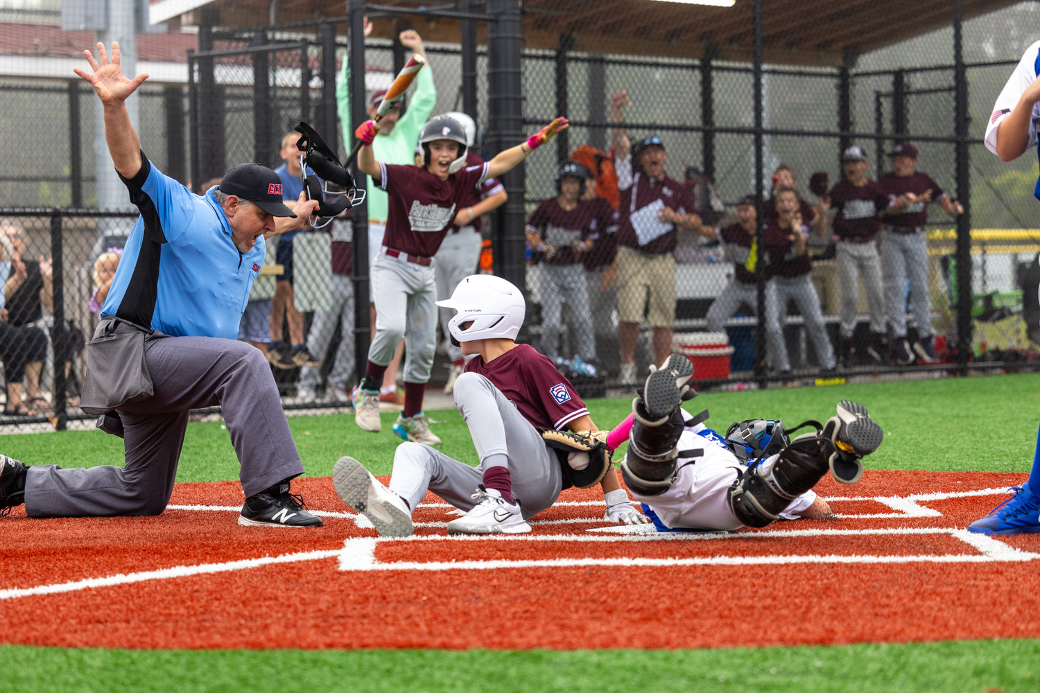 July 11 -  Safe! James Balnis scores the game-winning run in the East Hampton 12-and-under All-Stars defeated Riverhead, 2-1, to reach the district finals.  RON ESPOSITO