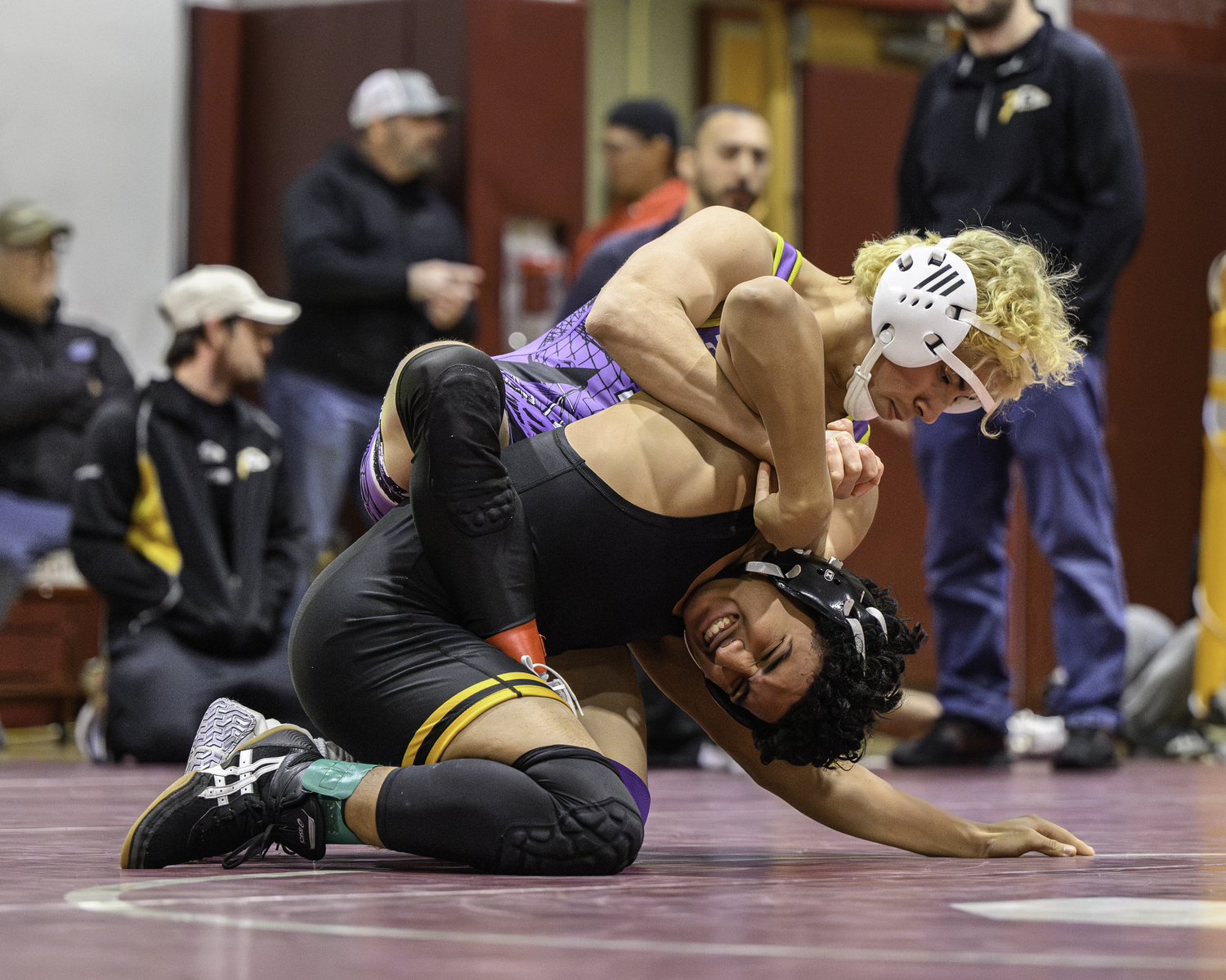 David Fernandez tries to take down his Sachem North opponent.  MARIANNE BARNETT