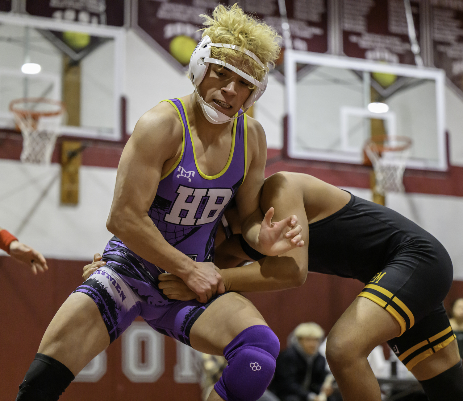 David Fernandez tries to block an incoming Sachem North wrestler.  MARIANNE BARNETT