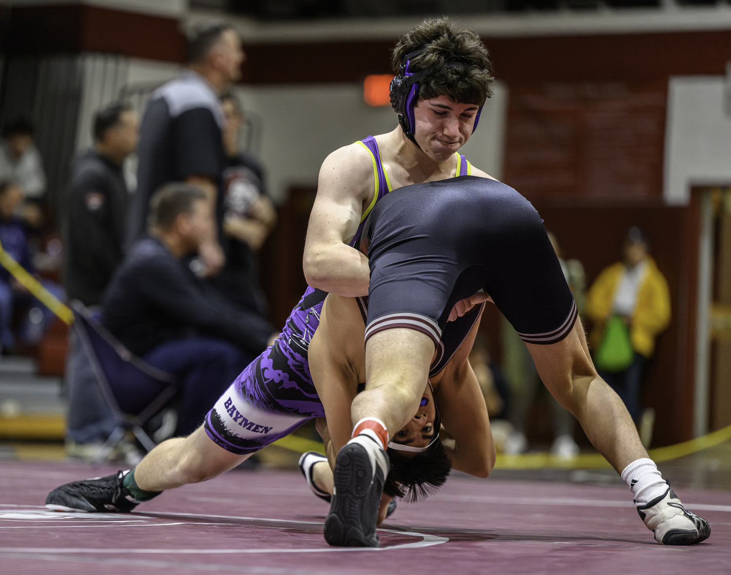 Jack DeBenedette sprawls to block a Mount Sinai wrestler's shot.  MARIANNE BARNETT