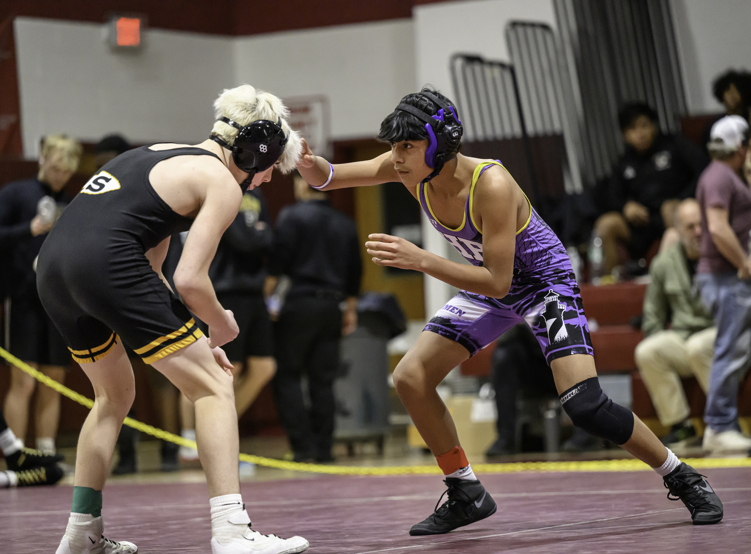 Danyer Carreto goes in to tangle with his Sachem North opponent.  MARIANNE BARNETT