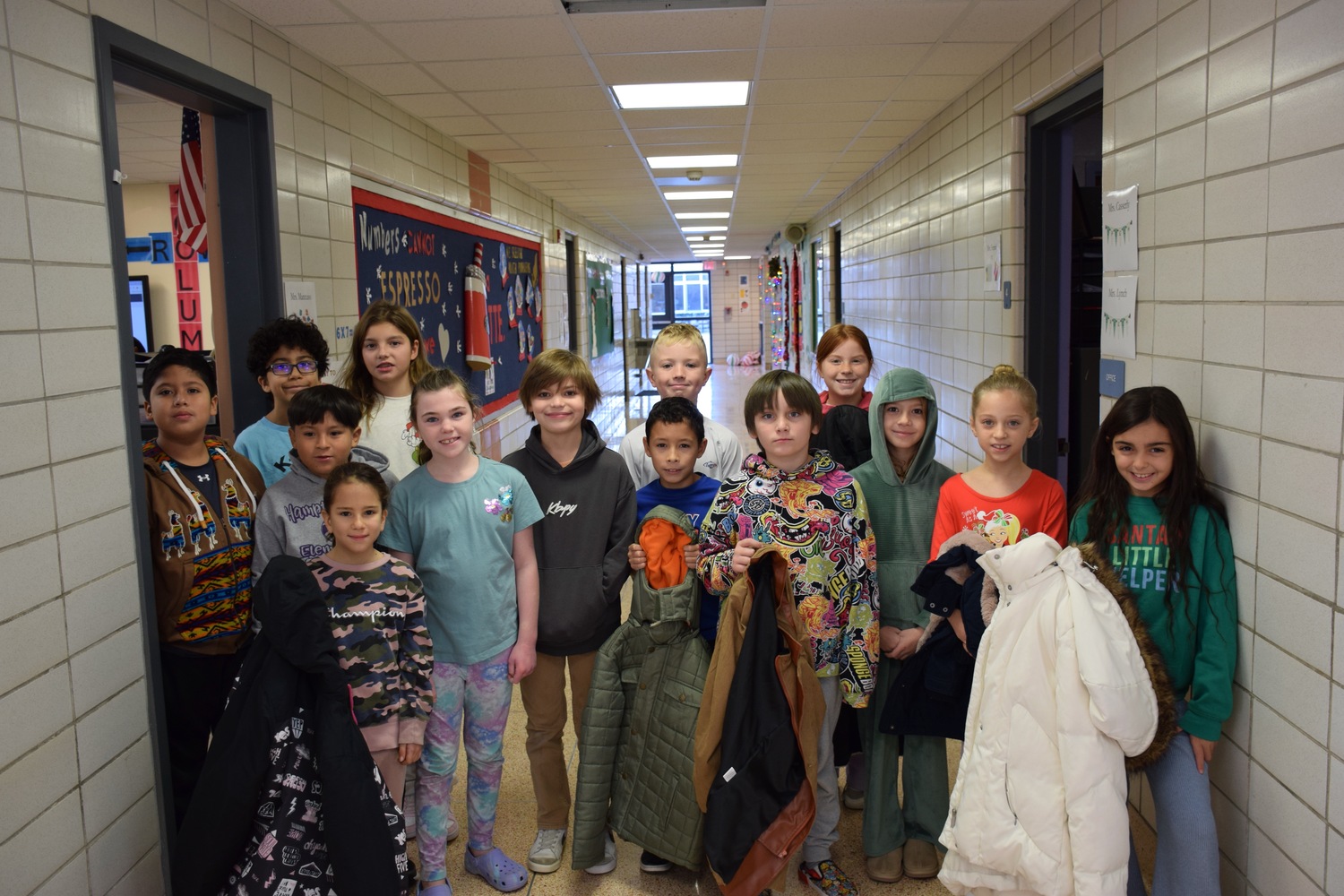 Members of the Hampton Bays Elementary School K-Kids service club recently hosted a successful drive to collect warm coats for those in need. All items will be donated to local community members in need. COURTESY HAMPTON BAYS SCHOOL DISTRICT