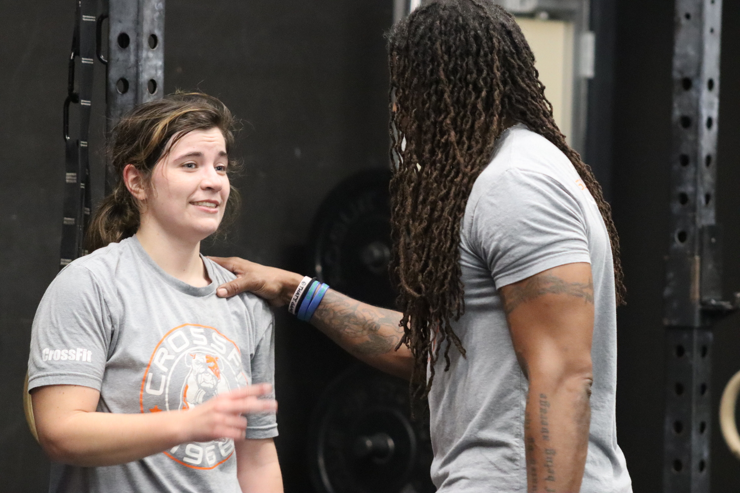 Claude Saturnin gives encouragement to Sheridan Basso. CAILIN RILEY