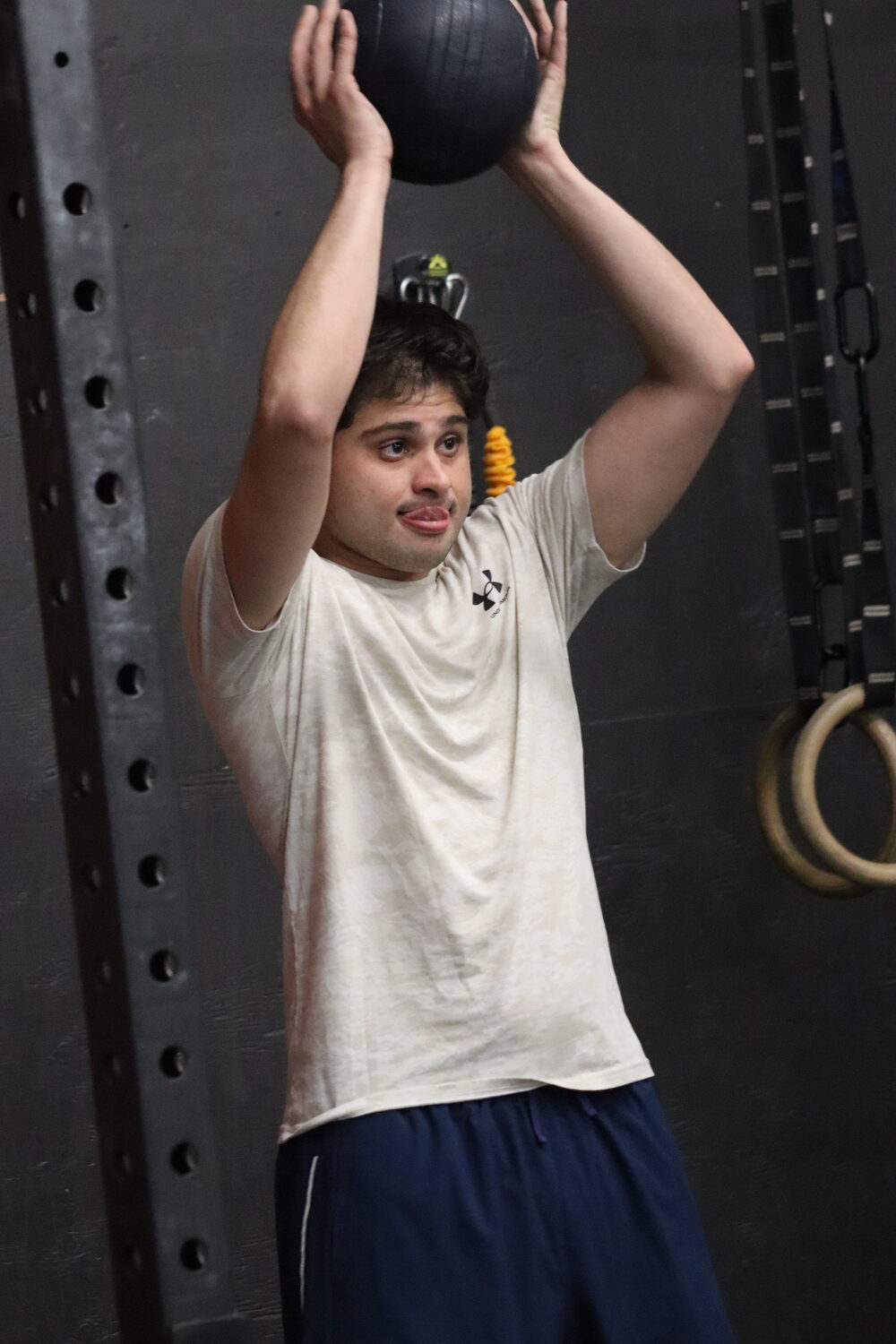 Christian Ciardello works with a medicine ball. CAILIN RILEY