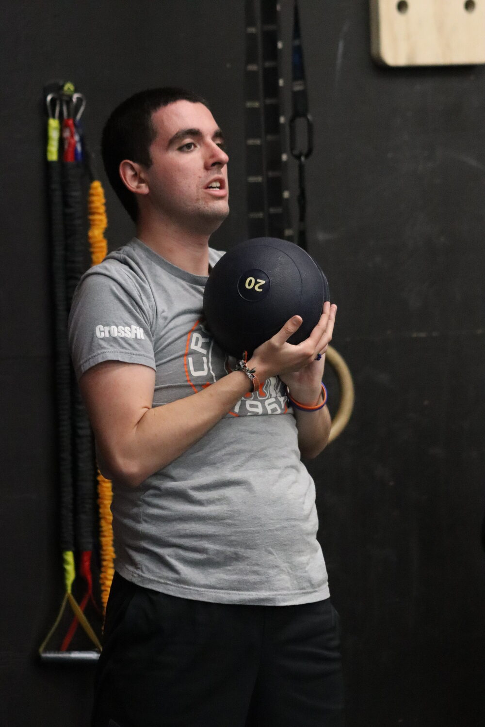 Eric Damon works with a medicine ball. CAILIN RILEY