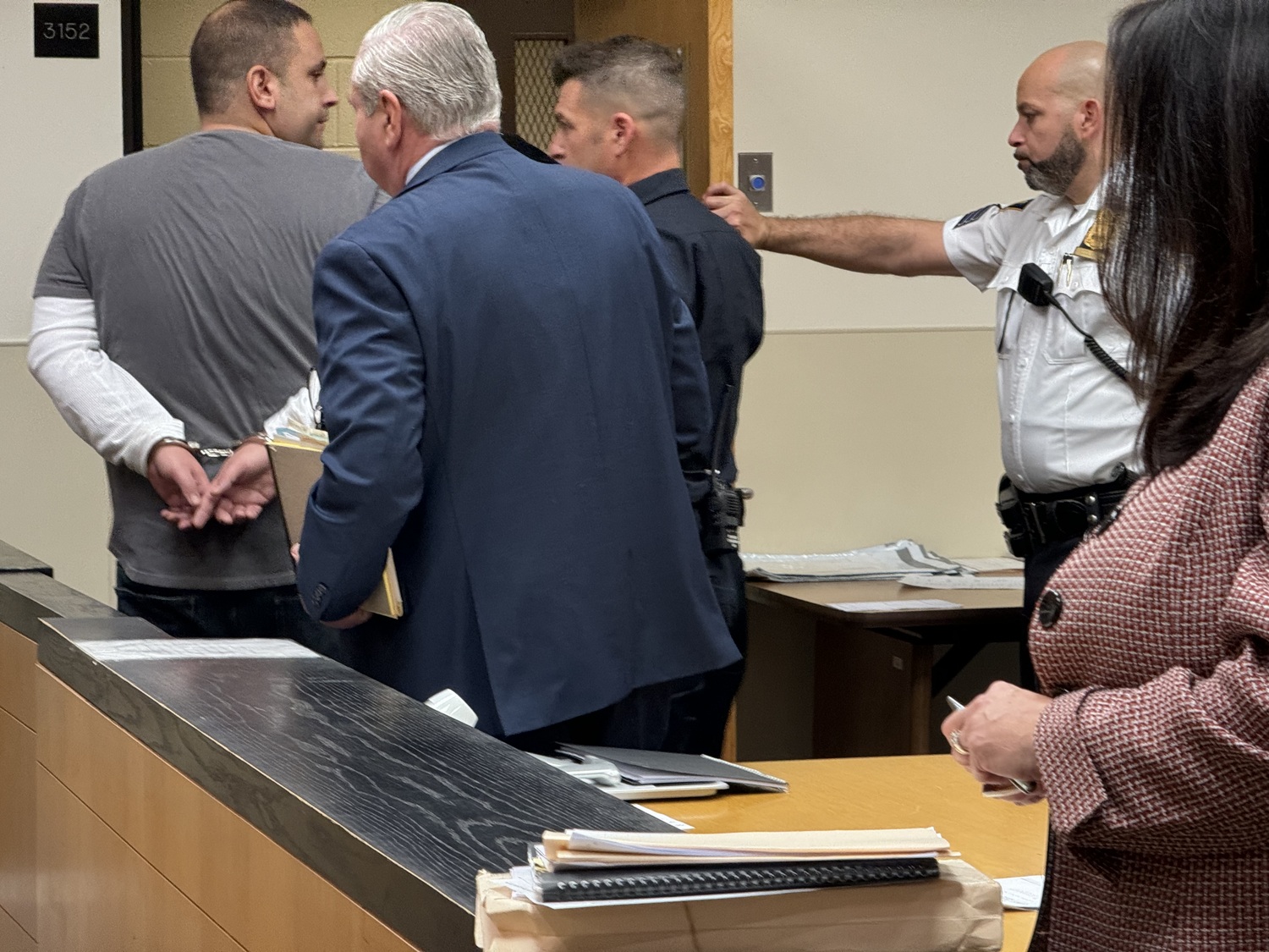 As he was led away to start his three-to-nine-year prison sentence, Mark Ripolone glanced back briefly at two members of his family seated in the courtroom.   T.E. MCMORROW