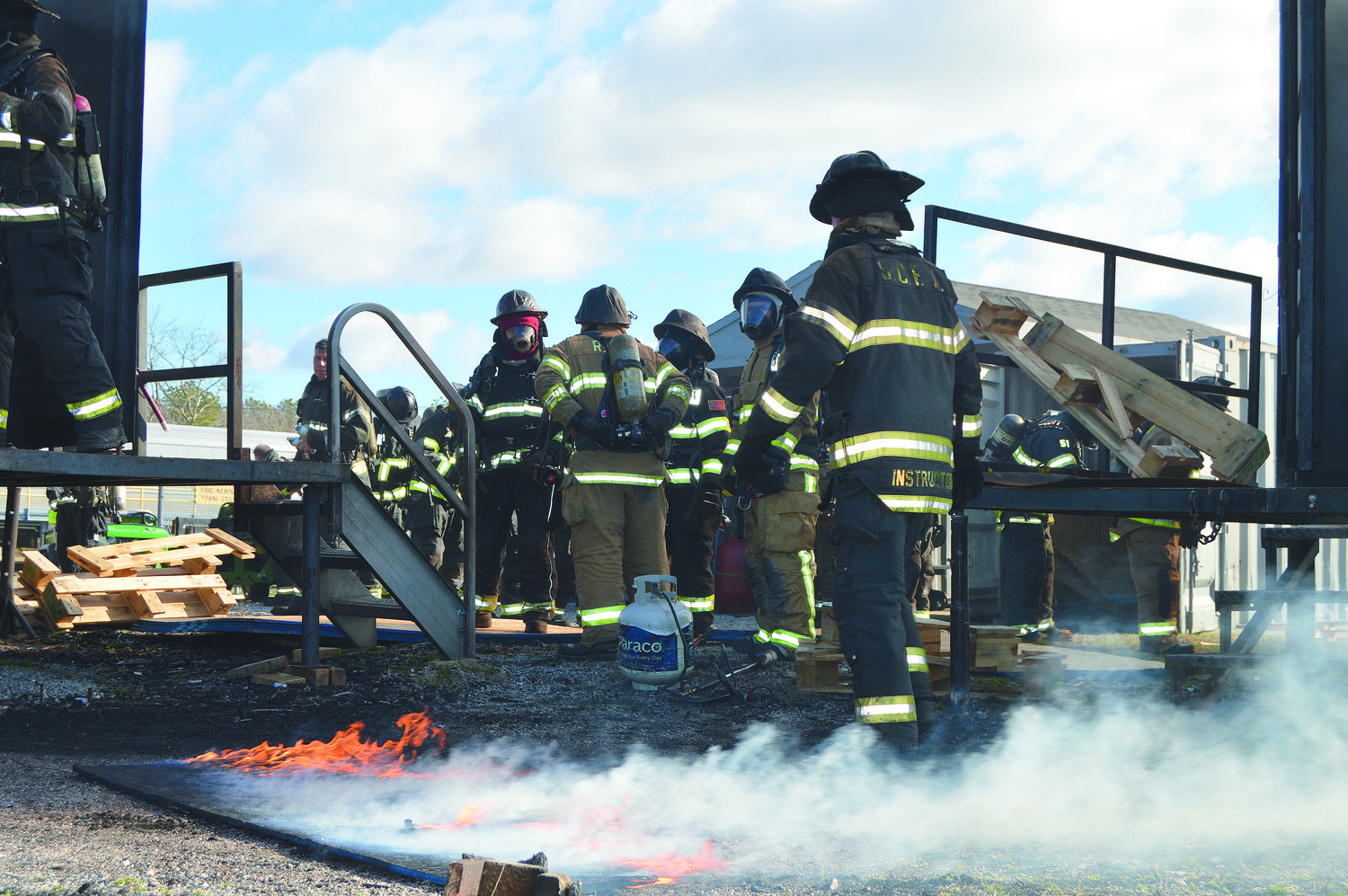 May 23 - Despite declining numbers, men and women are still answering the call to become volunteer firefighters — and tackling the difficult, sometimes dangerous training that is required. A new group of “probies” — probationary
firefighters — recently arrived at the Suffolk County Fire Academy, coming from a variety of different backgrounds. TOM GOGOLA