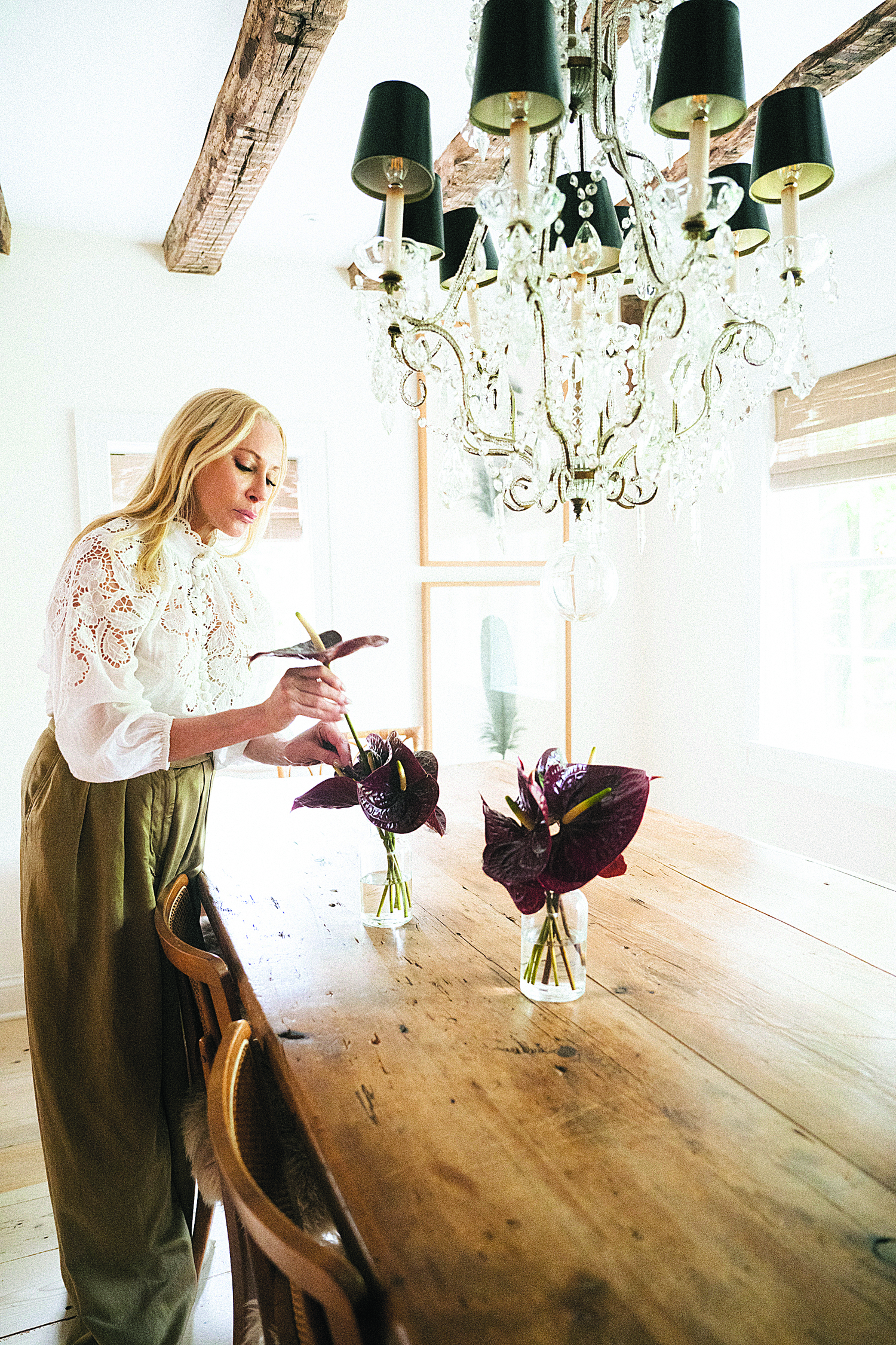 August 15 - House Proud: Saving a Piece of East Hampton History: Jackie Aster is home in the former Riding Club
East Hampton has long proven its historic value with treasured monuments and properties that have earned their right to be preserved. Longtime local Jackie Astier demonstrates true beauty and adulation in her refurbished house that was once The Riding Club of East Hampton. “Casual and precise,” this property is a sacred gem to the community. The property is a landmarked historic building dating back to 1752. Once owned by stage, screen and radio actor Frank Lovejoy, it earned Astier an award for restoration and preservation from the Village Preservation Society of East Hampton with applause to her victory of keeping the house’s bones intact and highlighted. Modernizing every inch of the house to bring its soul into active fruition was the ultimate trajectory of the assignment. “It was a serious project,” she said. “We exposed the beams, and I wanted to celebrate the integrity of the age of the property. My design direction was a Scandinavian barn vibe, and I didn’t want to get too busy with patterns and wallpapers. I wanted it to feel like a part of the new and the old.”          Macrae Marran