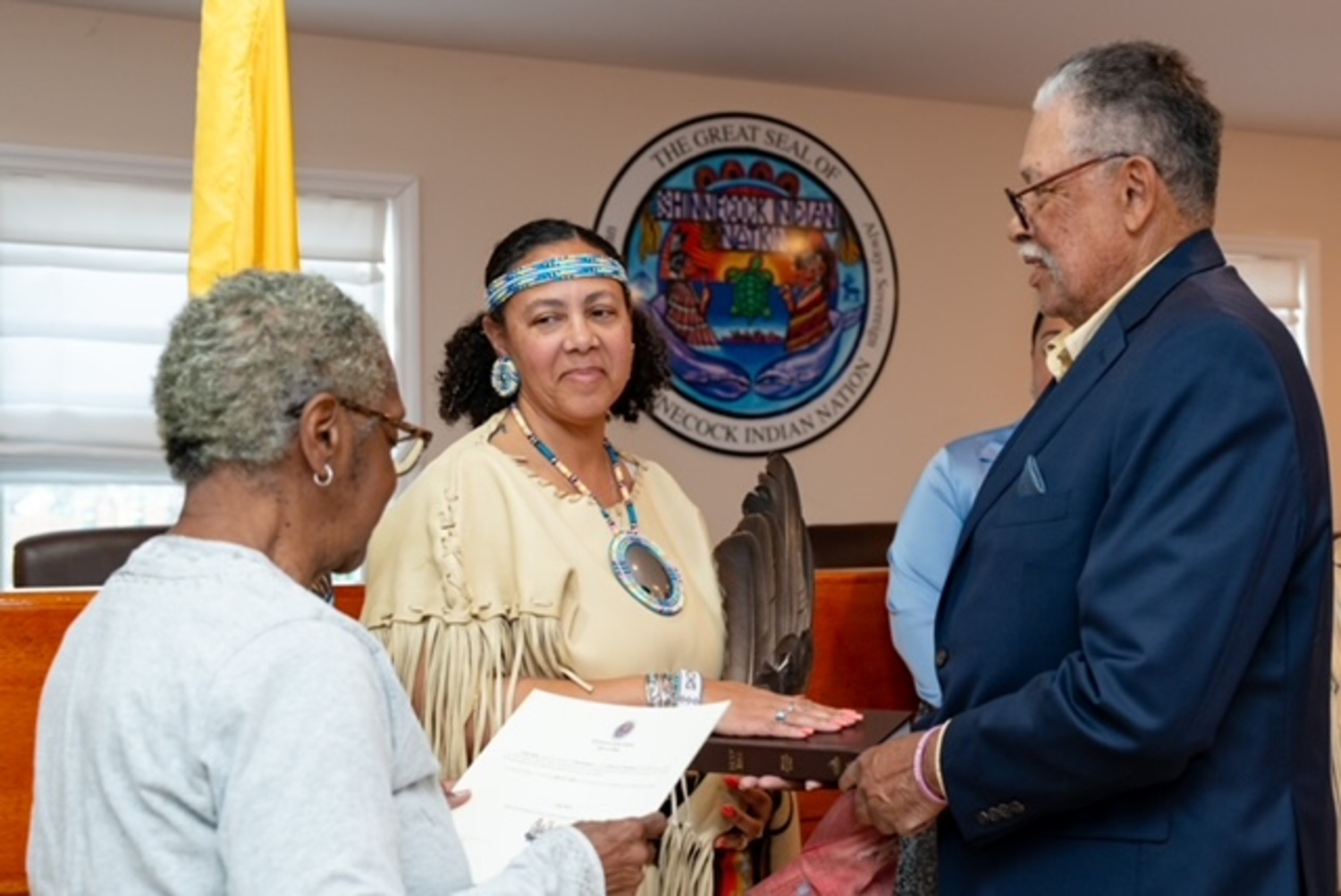 April 11 - Lisa Goree was sworn in on Tuesday night as the new chair of the Shinnecock Nation Council of Trustees. Goree became the first woman to
serve in that role. REBEKAH PHOENIX WISE