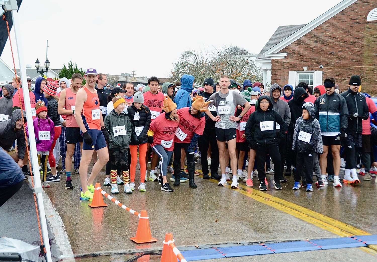 Despite the rain, over 600 people ran in the Montauk Turkey Trot races on Thanksgiving.   KYRIL BROMLEY