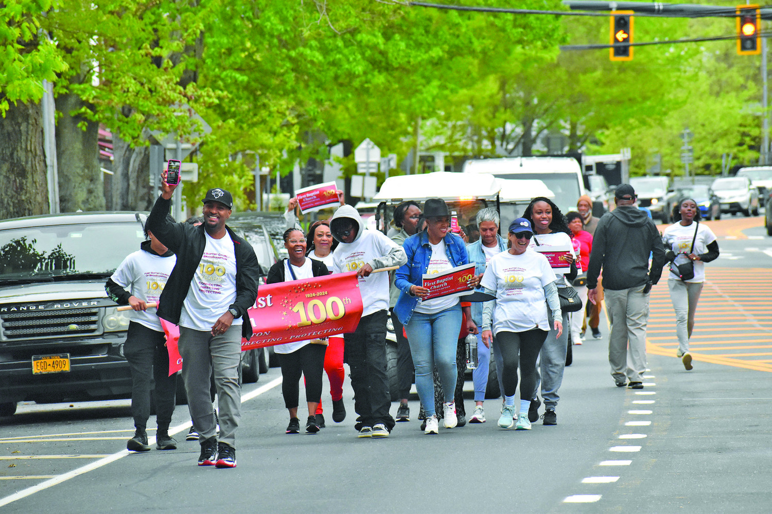 May 30 - Members of the First Baptist Church of Bridgehampton marched on Montauk Highway on May 19 from their original home on Corwith Avenue to their current church on the Bridgehampton-Sag Harbor Turnpike to celebrate the congregation’s centennial. STEPHEN J. KOTZ