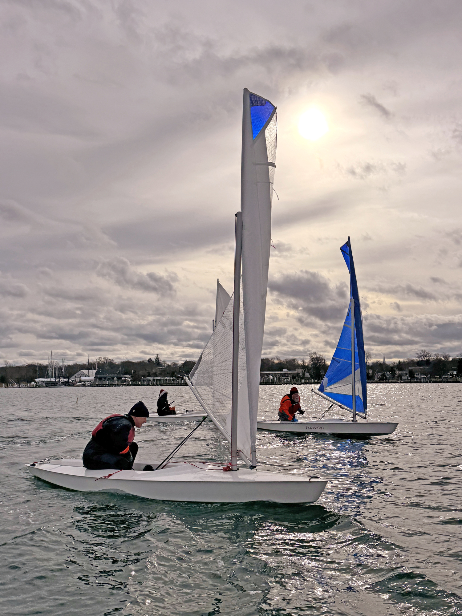 Nick Gazzolo eyeing the pin end of the finish line, with Joan Butler and Marty Knab off his port side.   MICHAEL MELLA