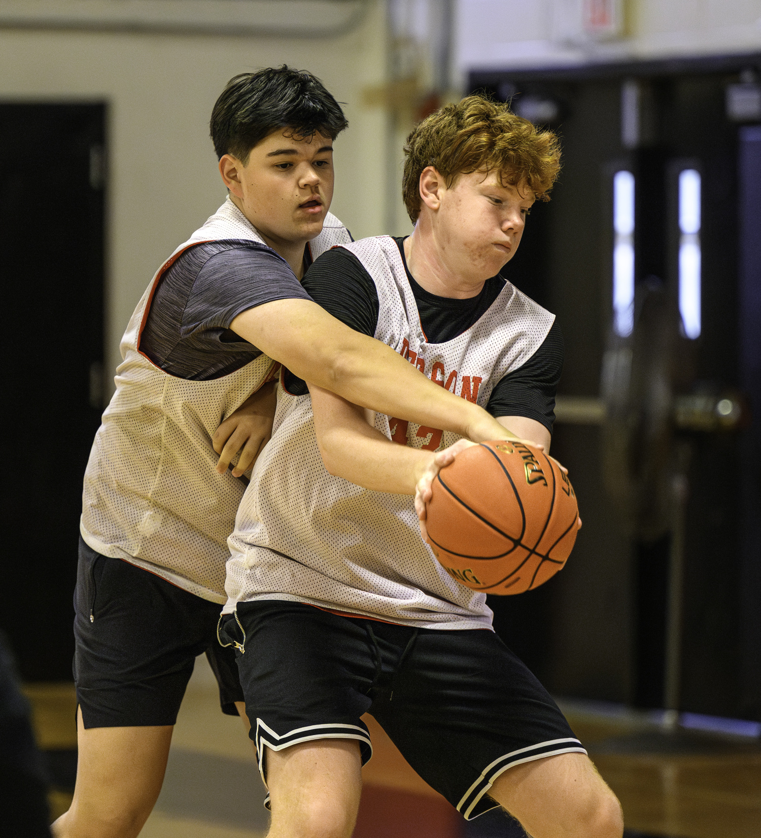 Paul Roesel, left, and Nate Culver go at in practice on Saturday morning.    MARIANNE BARNETT