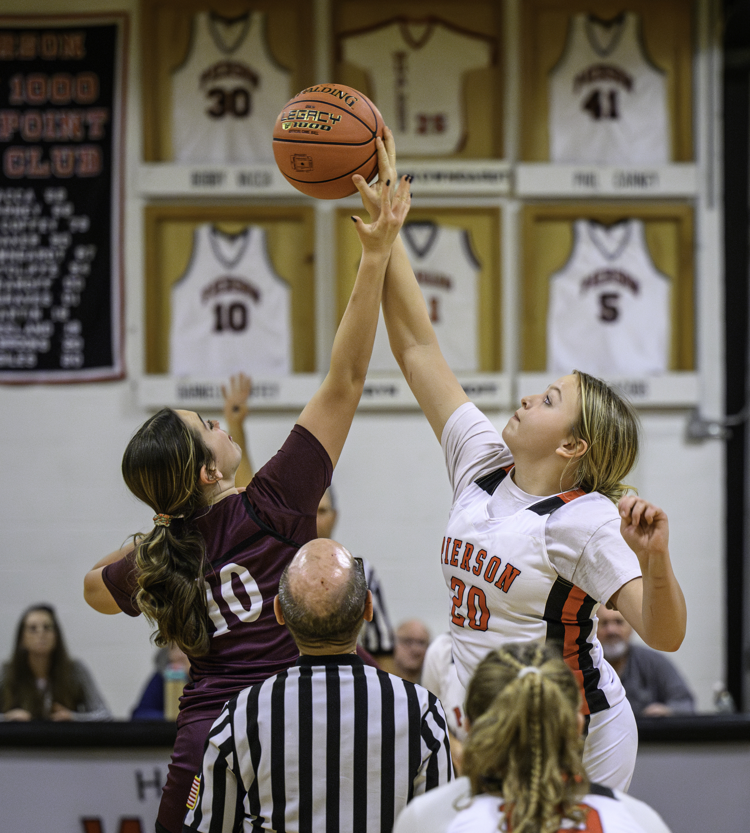 Pierson's Skye Smith and Southampton's Avery Greene take the opening tip-off.   MARIANNE BARNETT