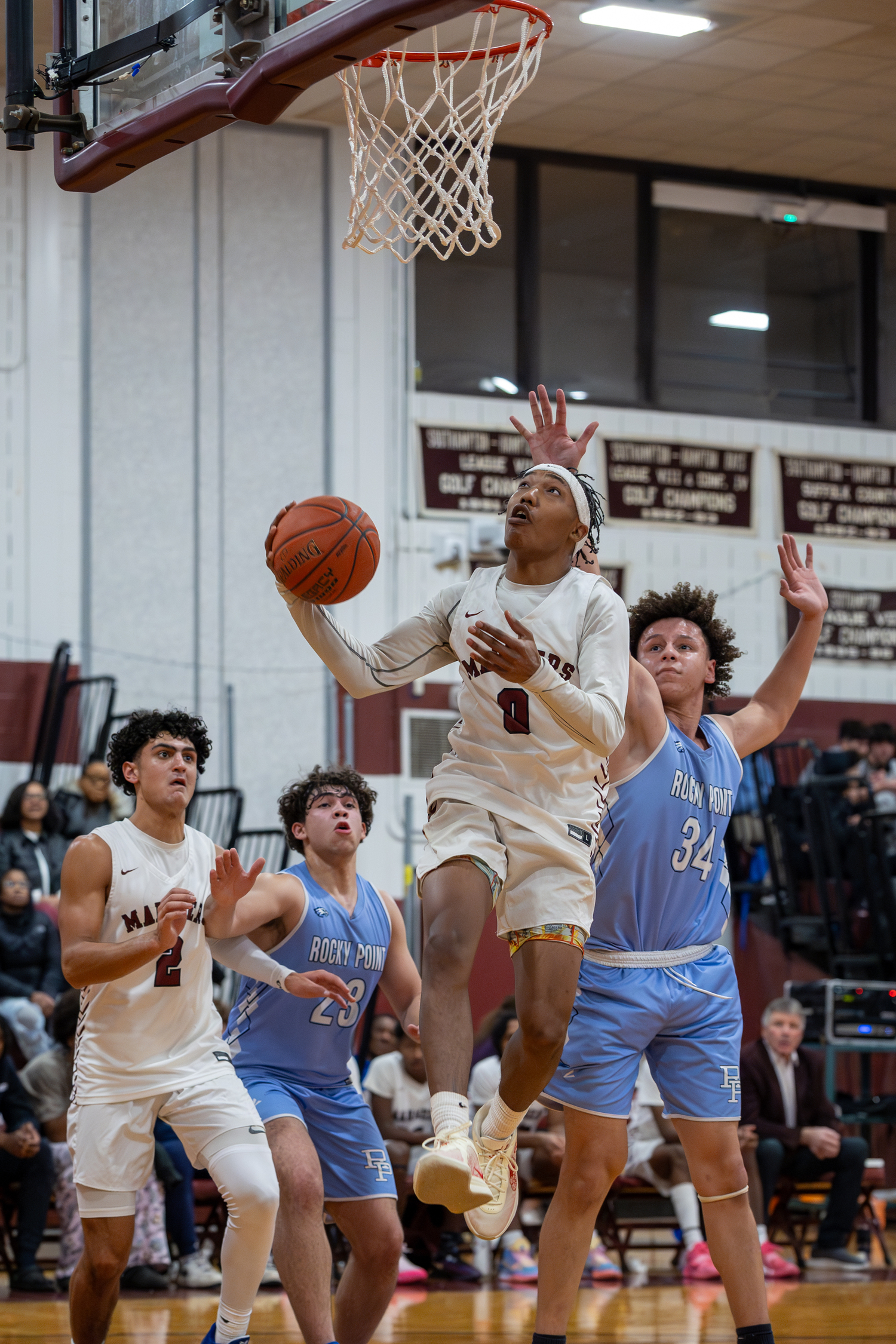 Southampton senior Naevon Williams goes up and under for a basket.  RON ESPOSITO/SOUTHAMPTON SCHOOL DISTRICT