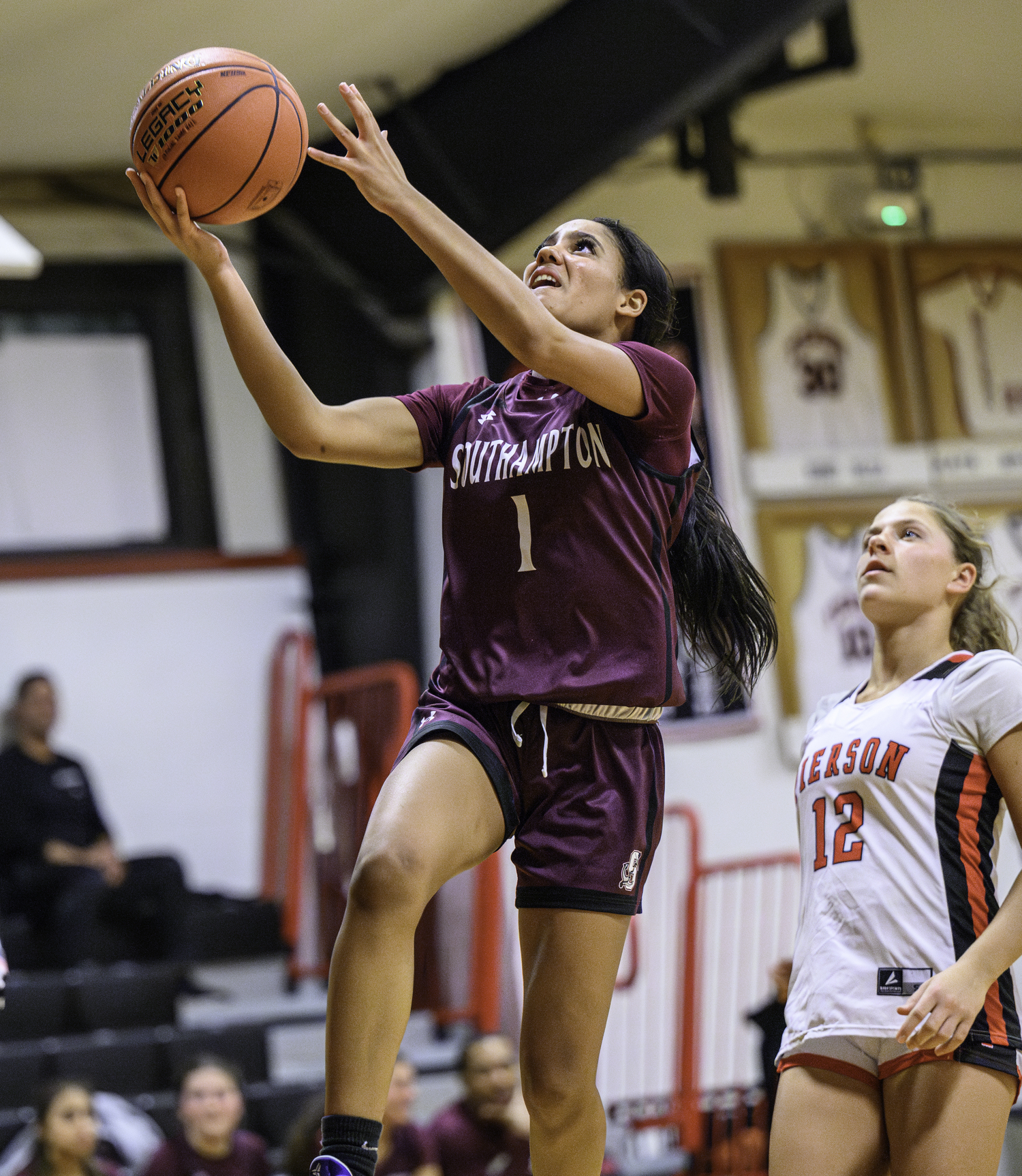 Southampton senior Daelyn Palmore goes in for two of her 26 points on Thursday, December 12, in Sag Harbor.   MARIANNE BARNETT