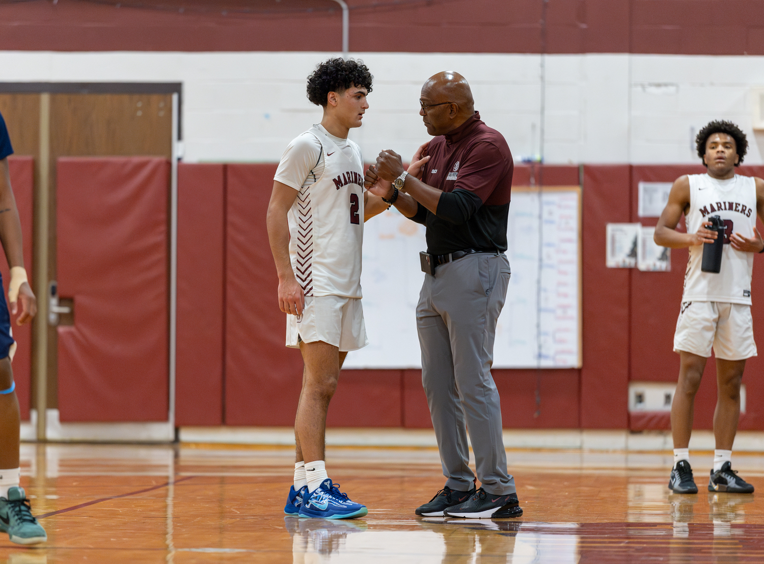 Alex Franklins listed intently to head coach Herm Lamison.   RON ESPOSITO/SOUTHAMPTON SCHOOL DISTRICT