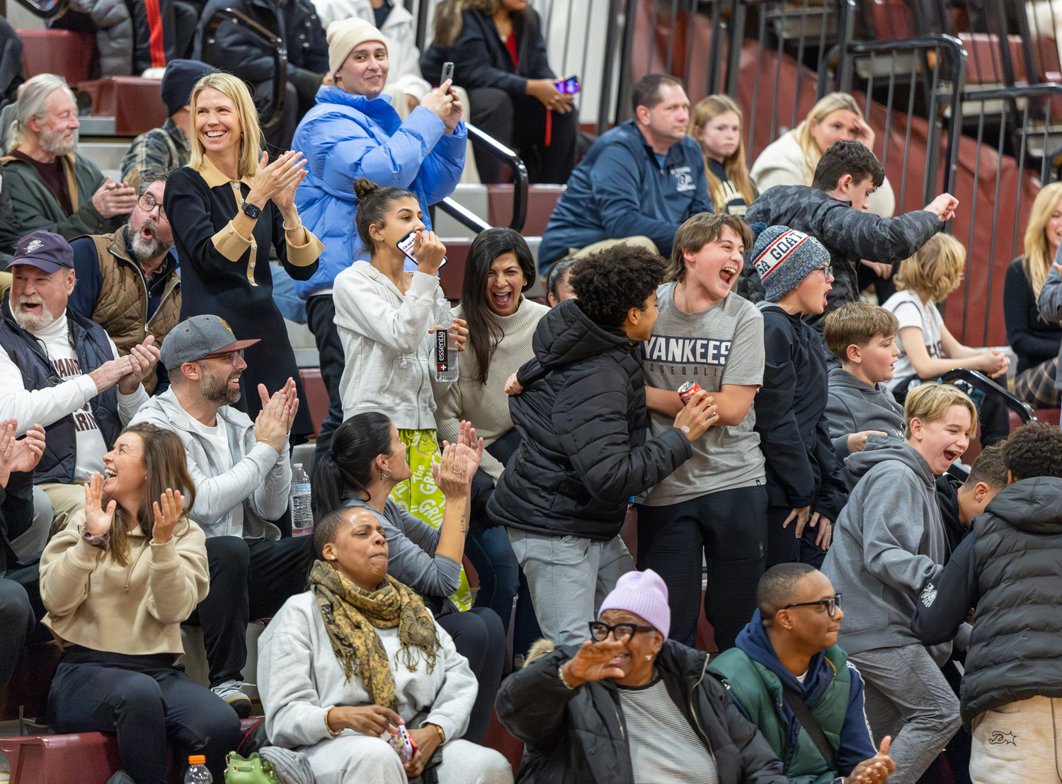 The hometown crowd reacts after Naevon Williams hit his second buzzer-beating halfcourt shot to close out the first half.   RON ESPOSITO/SOUTHAMPTON SCHOOL DISTRICT