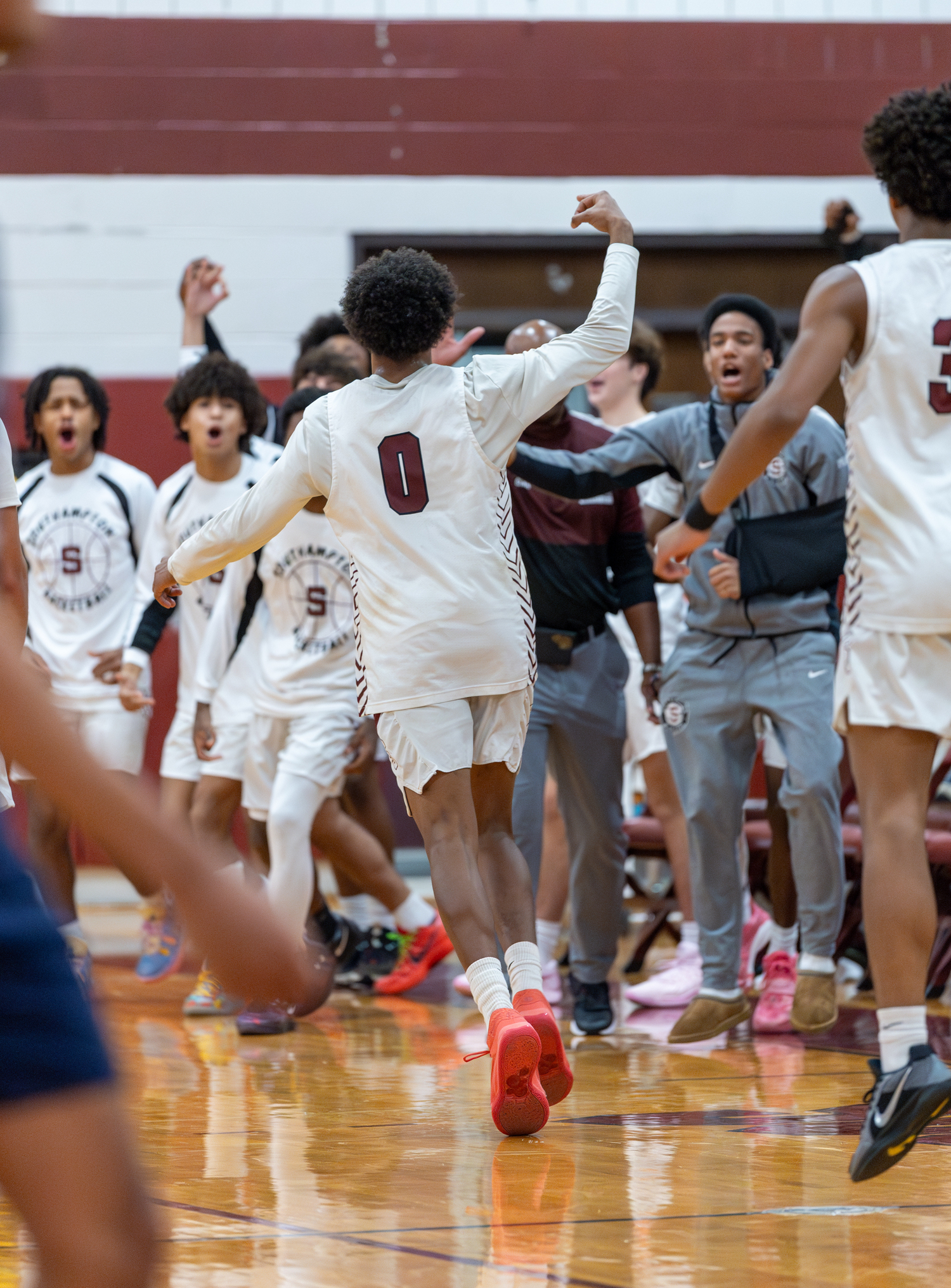 Southampton senior Naevon Williams reacts after hitting not one but two buzzer-beating halfcourt shots at the end of the first and second quarters.   RON ESPOSITO/SOUTHAMPTON SCHOOL DISTRICT