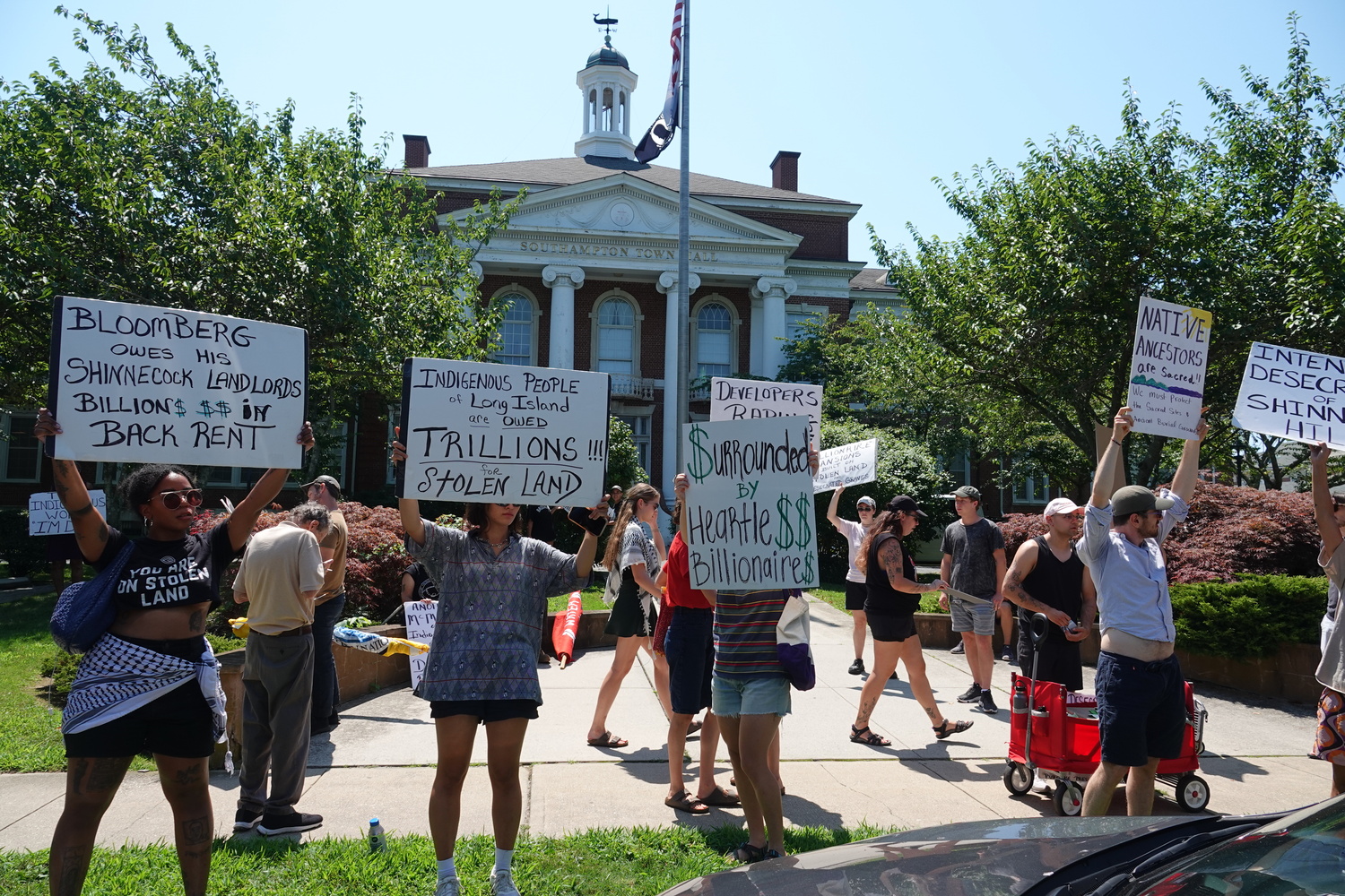 August 8 - Members of the Shinnecock Nation and their supporters held a rally outside Southampton Town Hall on August 5, calling on Southampton Town to dedicate more money from the Community Preservation Fund to preserving the tribe’s ancestral lands in Shinnecock Hills. MICHAEL WRIGHT