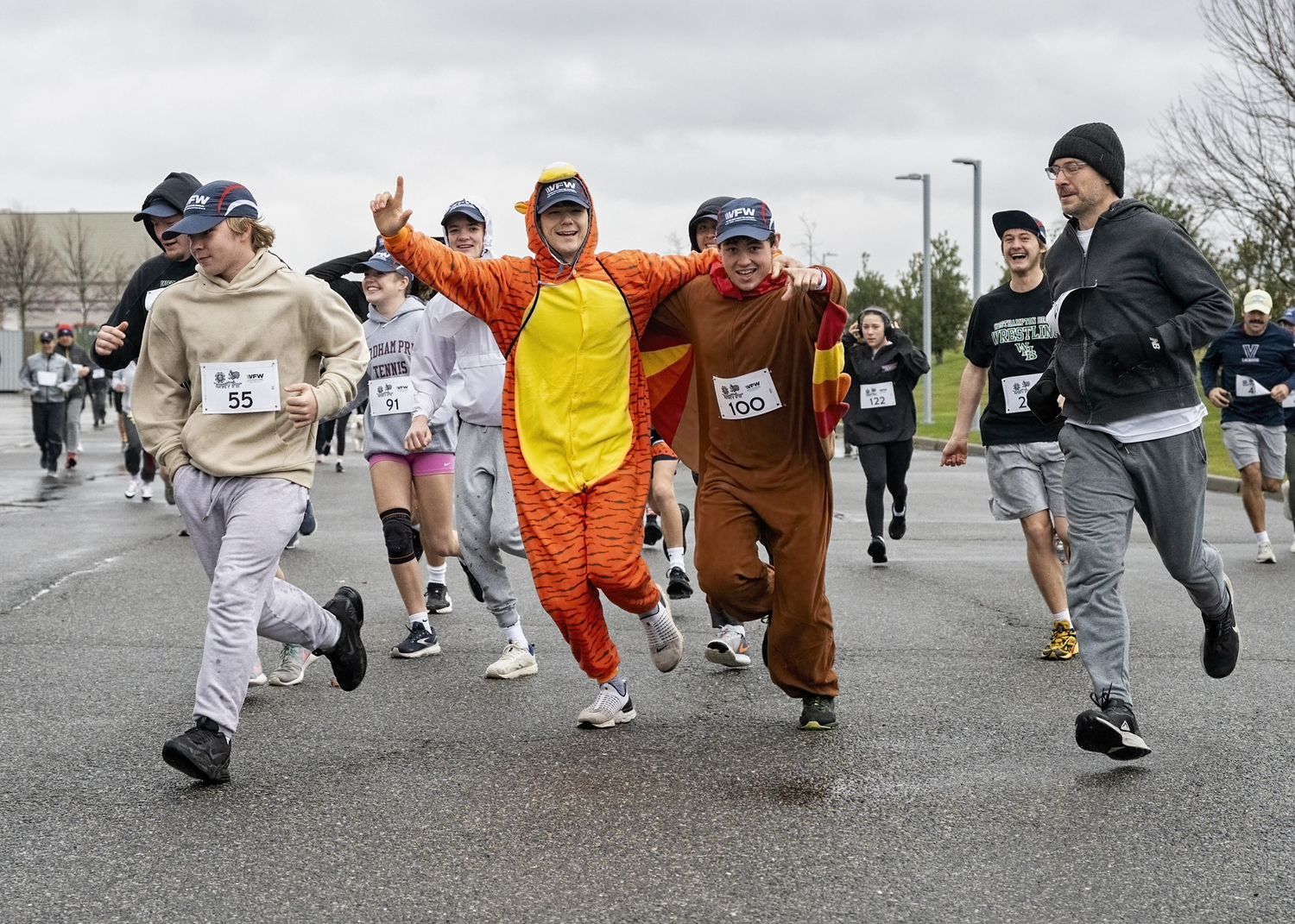 Trotters braved the rain on Thanksgiving day for the VFW Post 5350, Westhampton Beach Turkey Trot 5K Run/Walk at Gabreski Airport.  JOHN NEELY