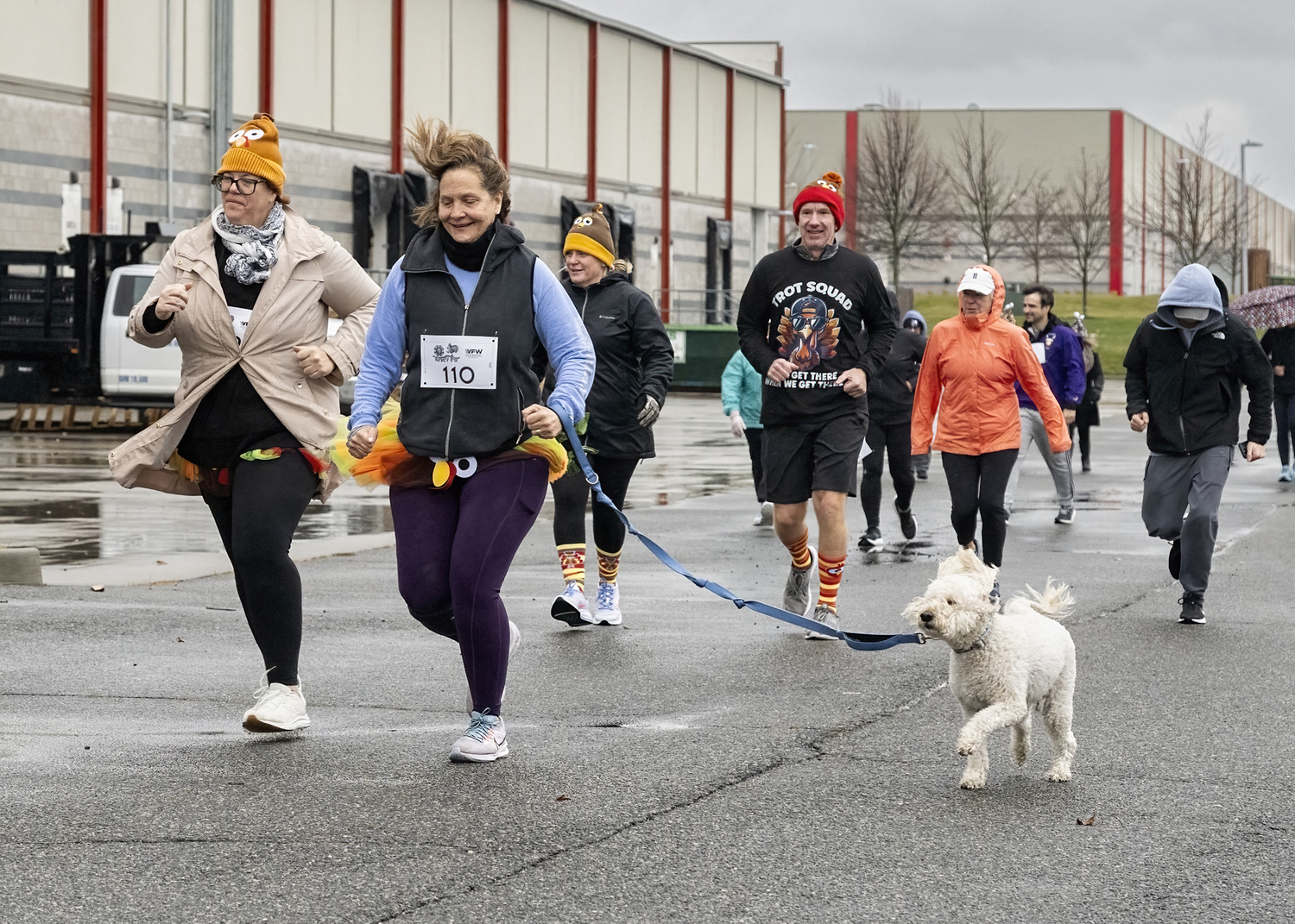 Trotters braved the rain on Thanksgiving day for the VFW Post 5350, Westhampton Beach Turkey Trot 5K Run/Walk at Gabreski Airport.  JOHN NEELY