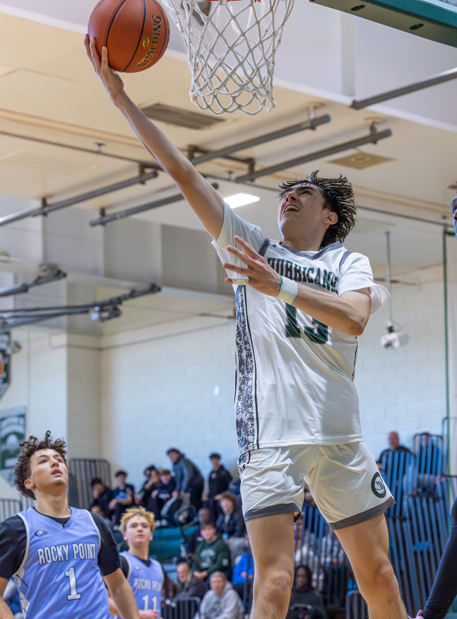 Senior guard Dante Quinones scores with a reverse layup. RON ESPOSITO