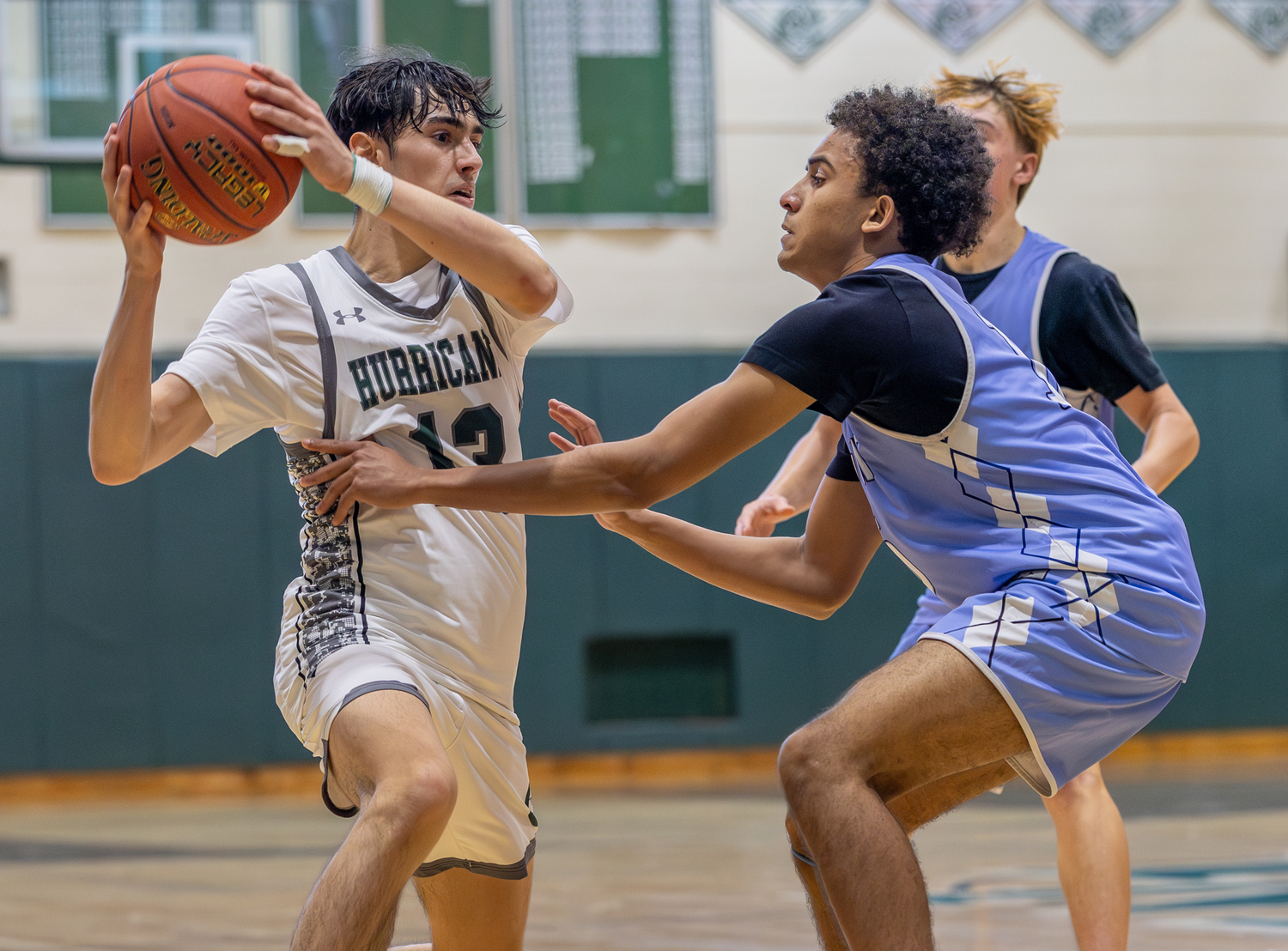 Senior guard Dante Quinones looks to pass the ball out of traffic. RON ESPOSITO