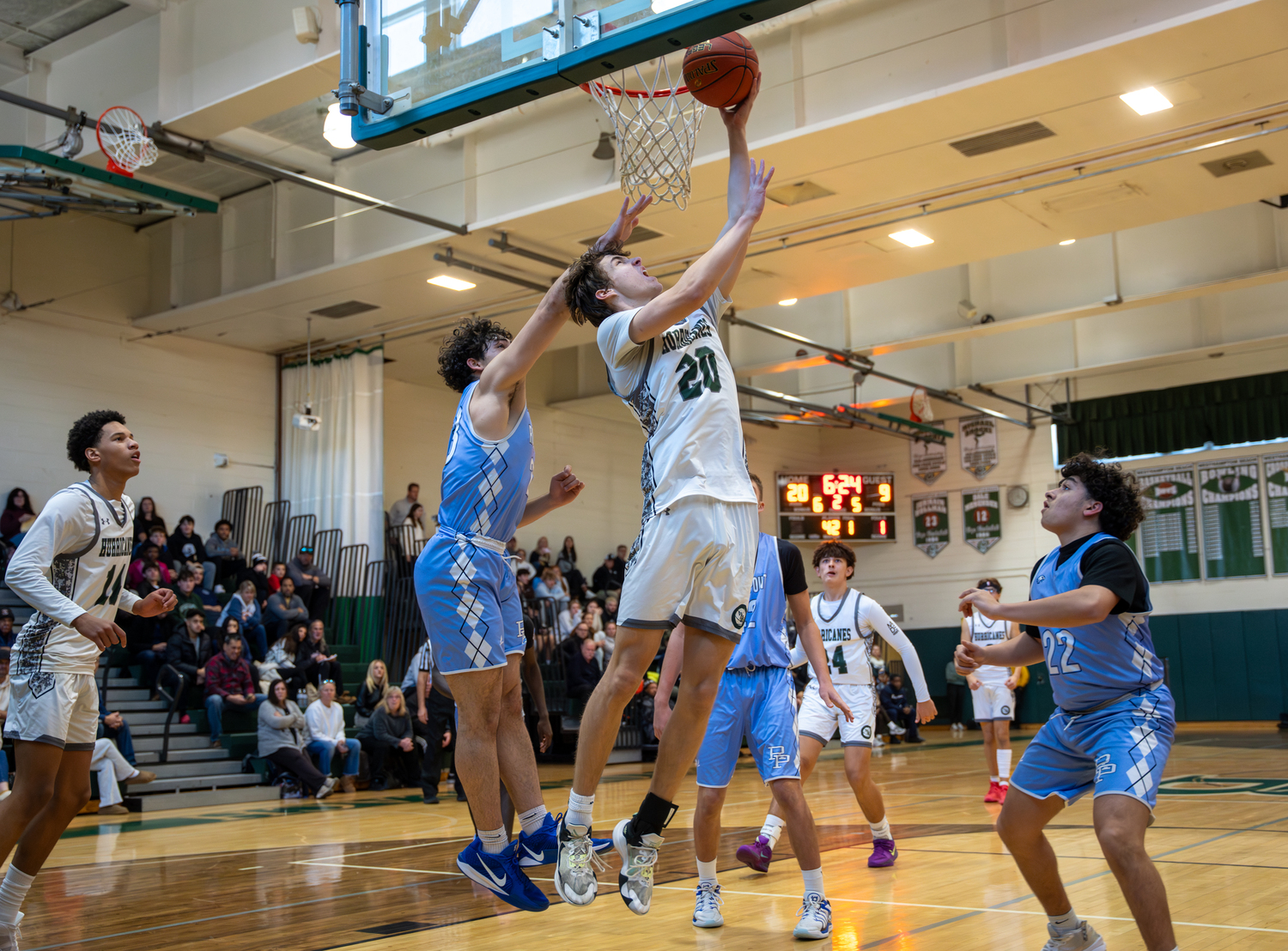 Junior forward Jacob Permakoff score from under the basket. RON ESPOSITO