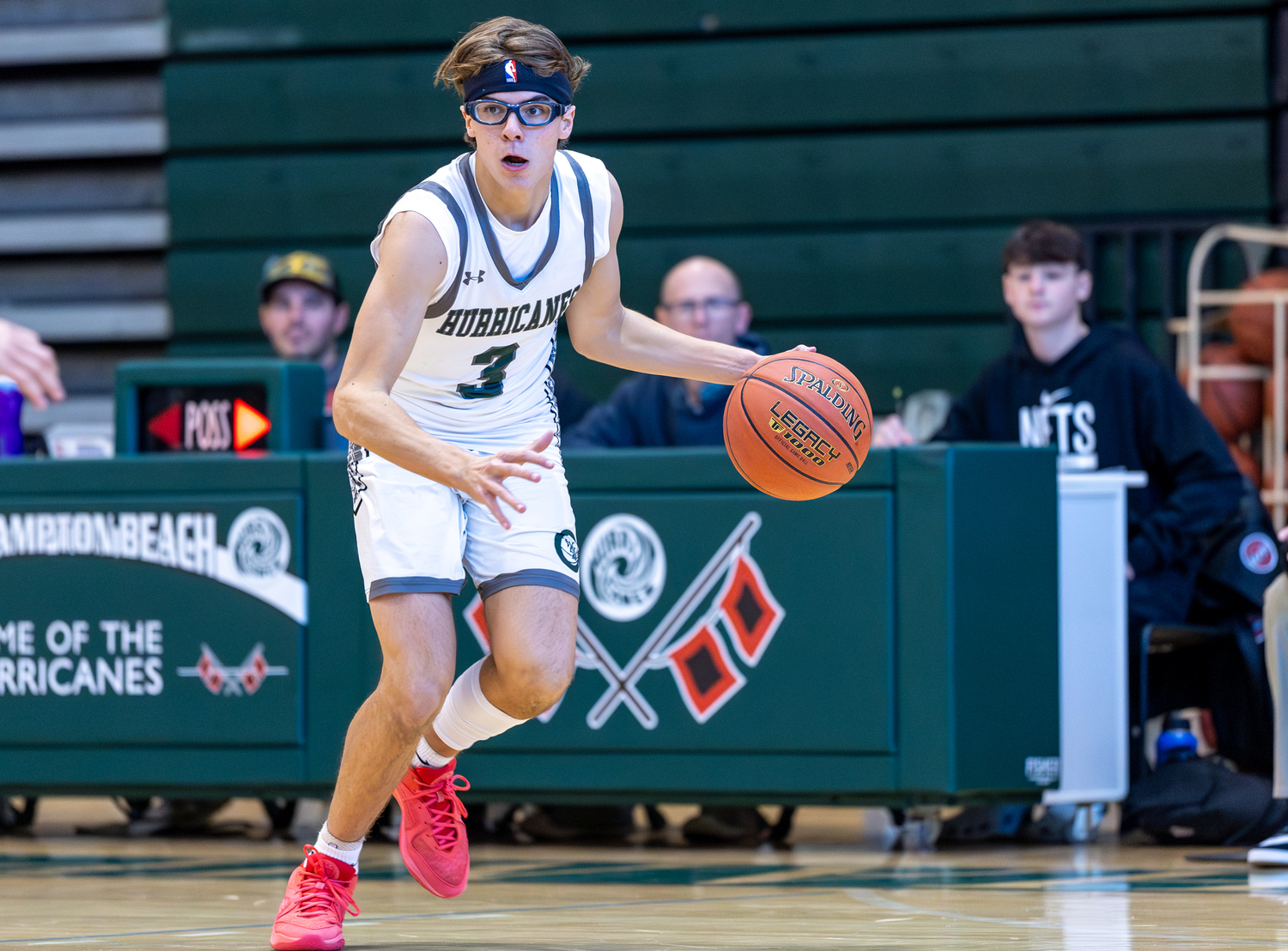 Sophomore guard Sam Quinn controls the ball. RON ESPOSITO